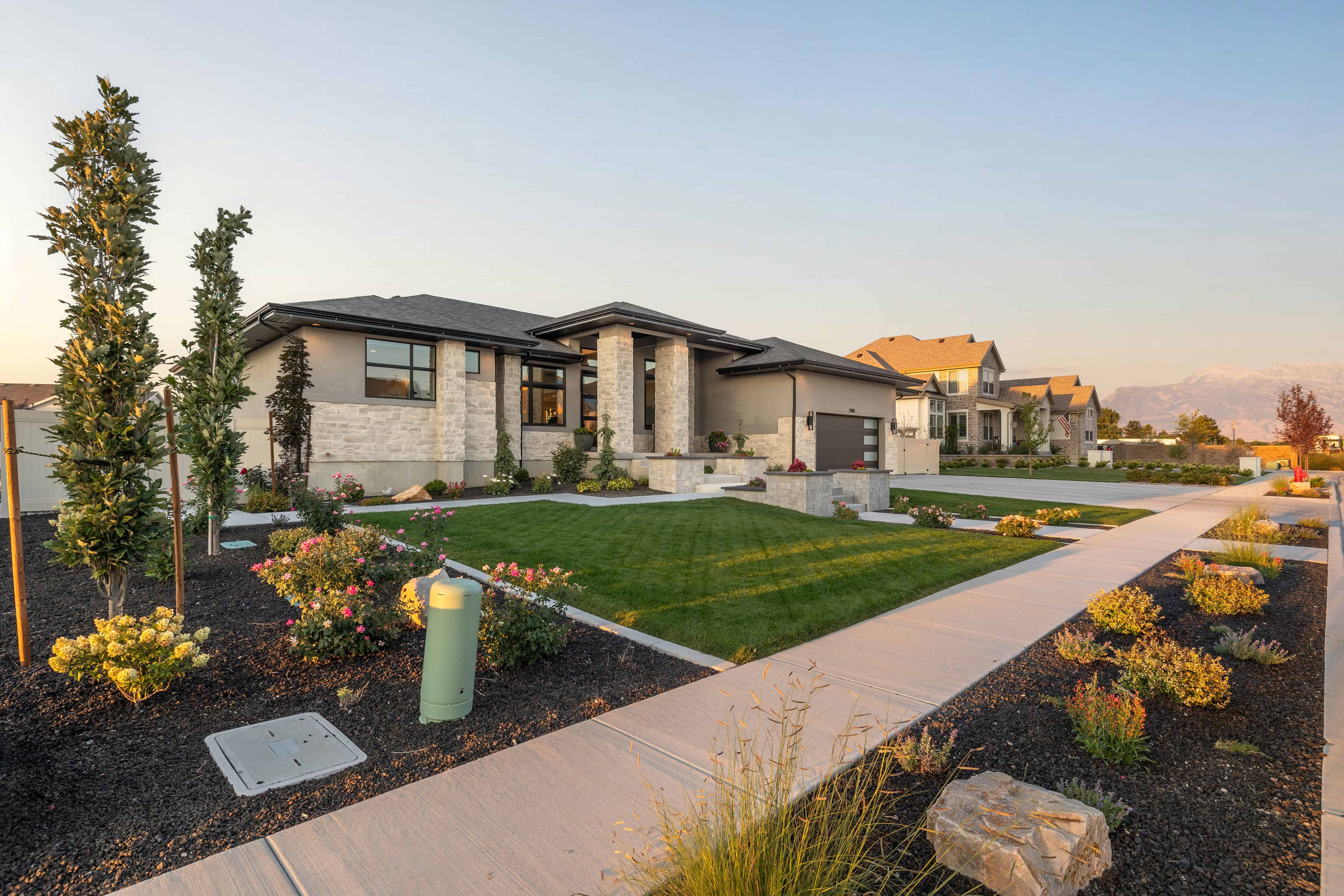 Front Yard with Concrete and Pavers Planters