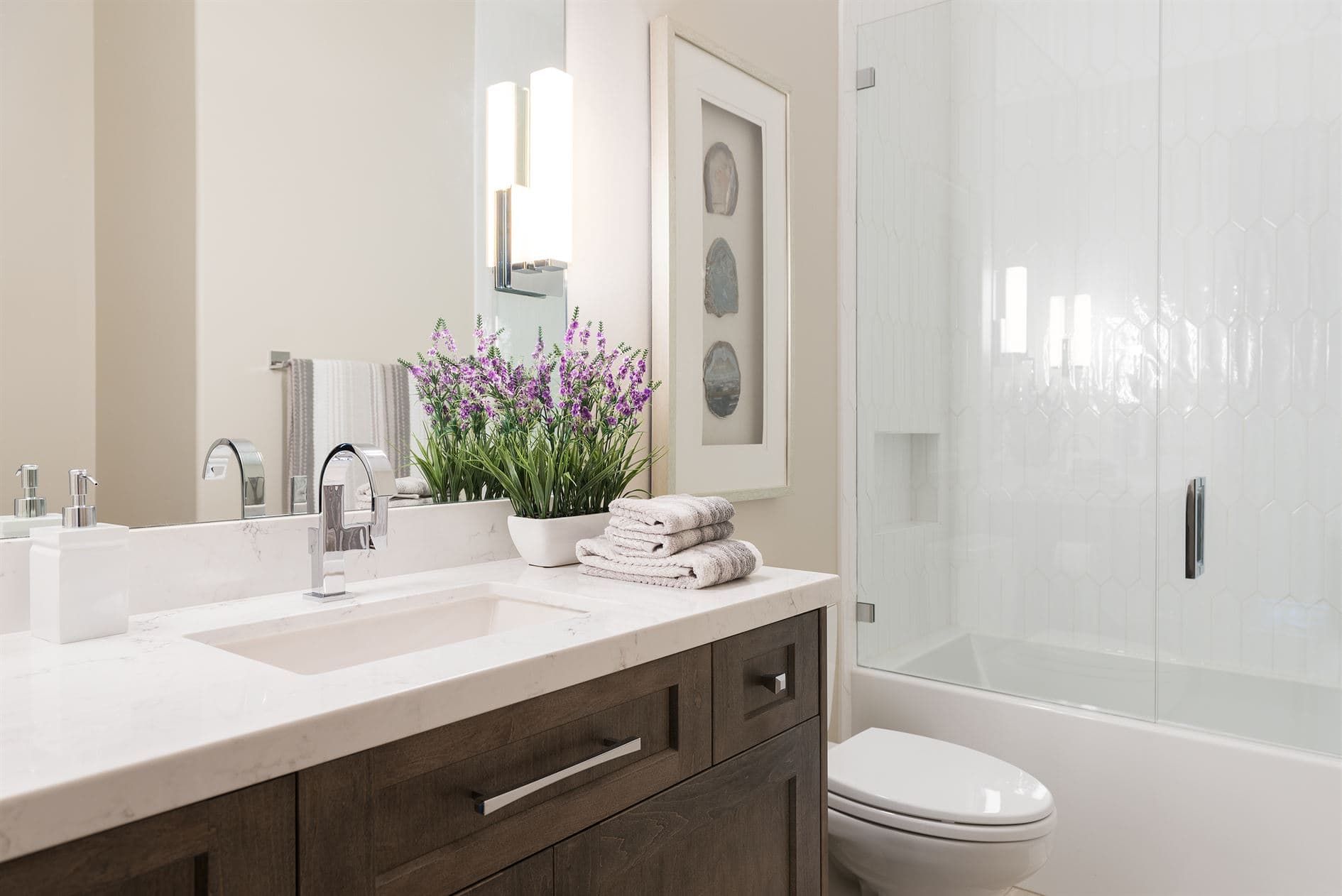 Second bathroom with vanity and shower in Salt Lake City home remodel.