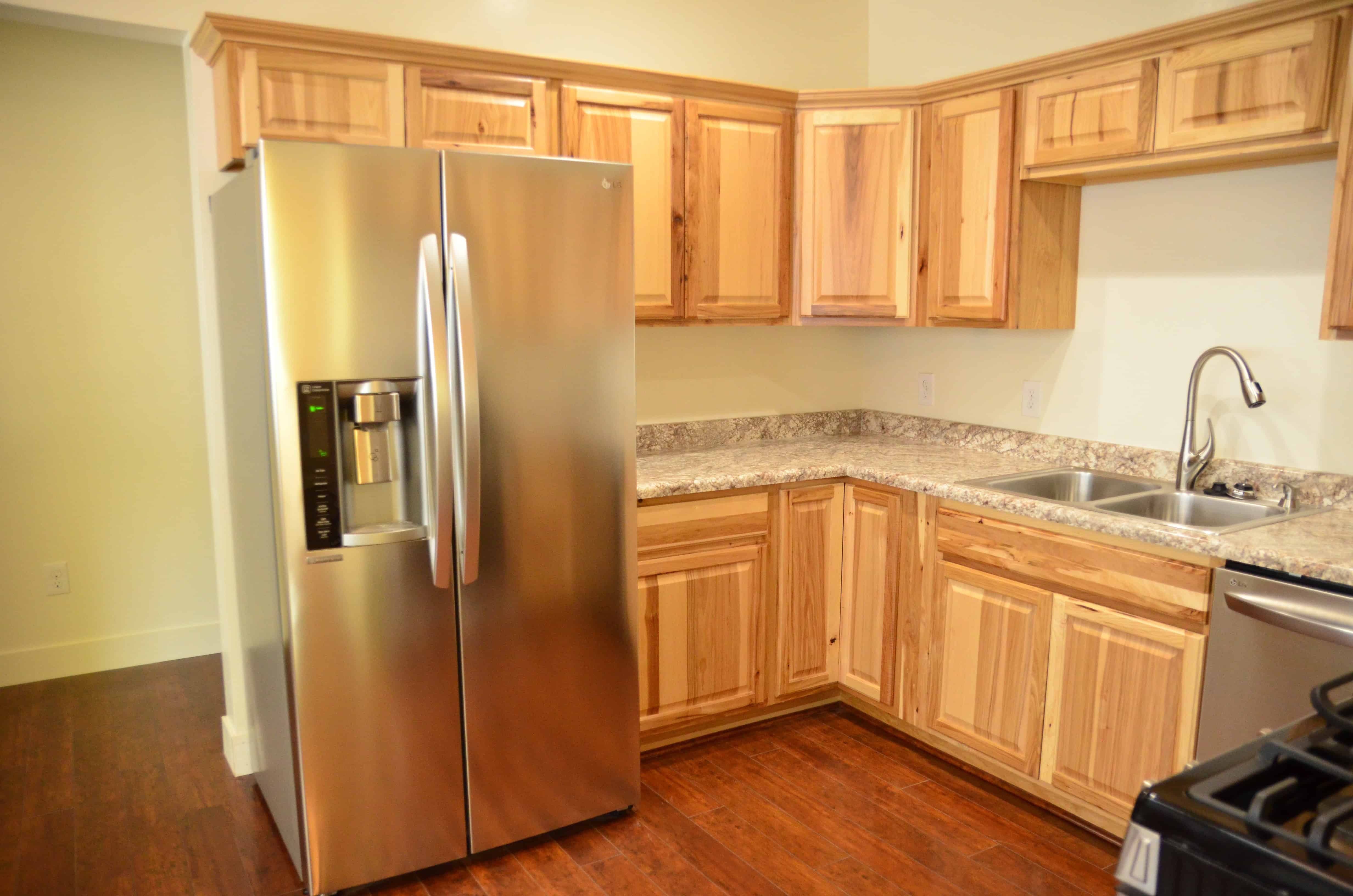 Modern kitchen remodel in Lehi, UT with island and custom cabinetry.