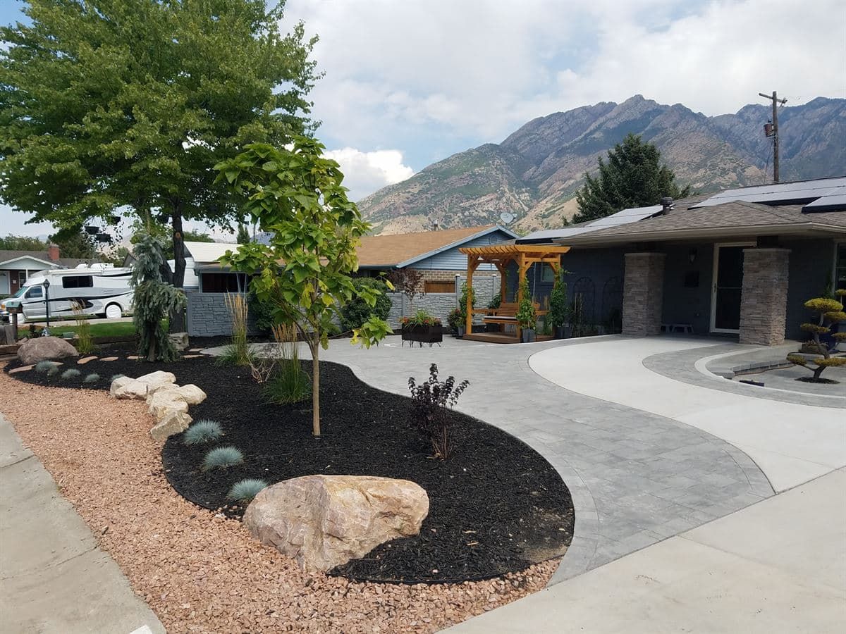 Gray Concrete Driveway and Pavers Patio in Salt Lake City, Utah