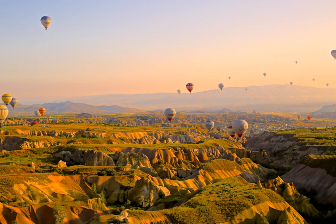 Balloons over landscape