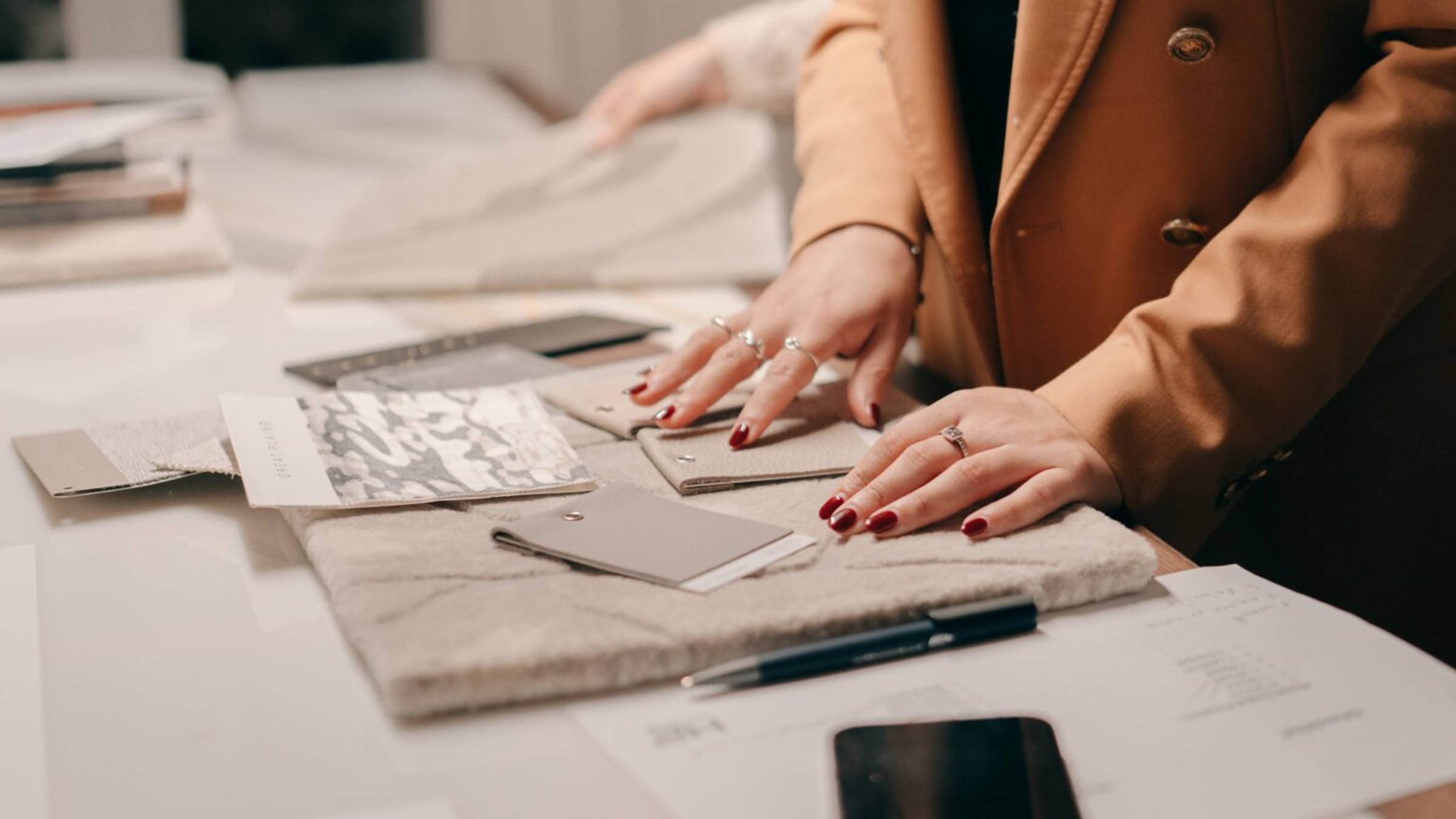 Designers reviewing fabric samples in the London studio