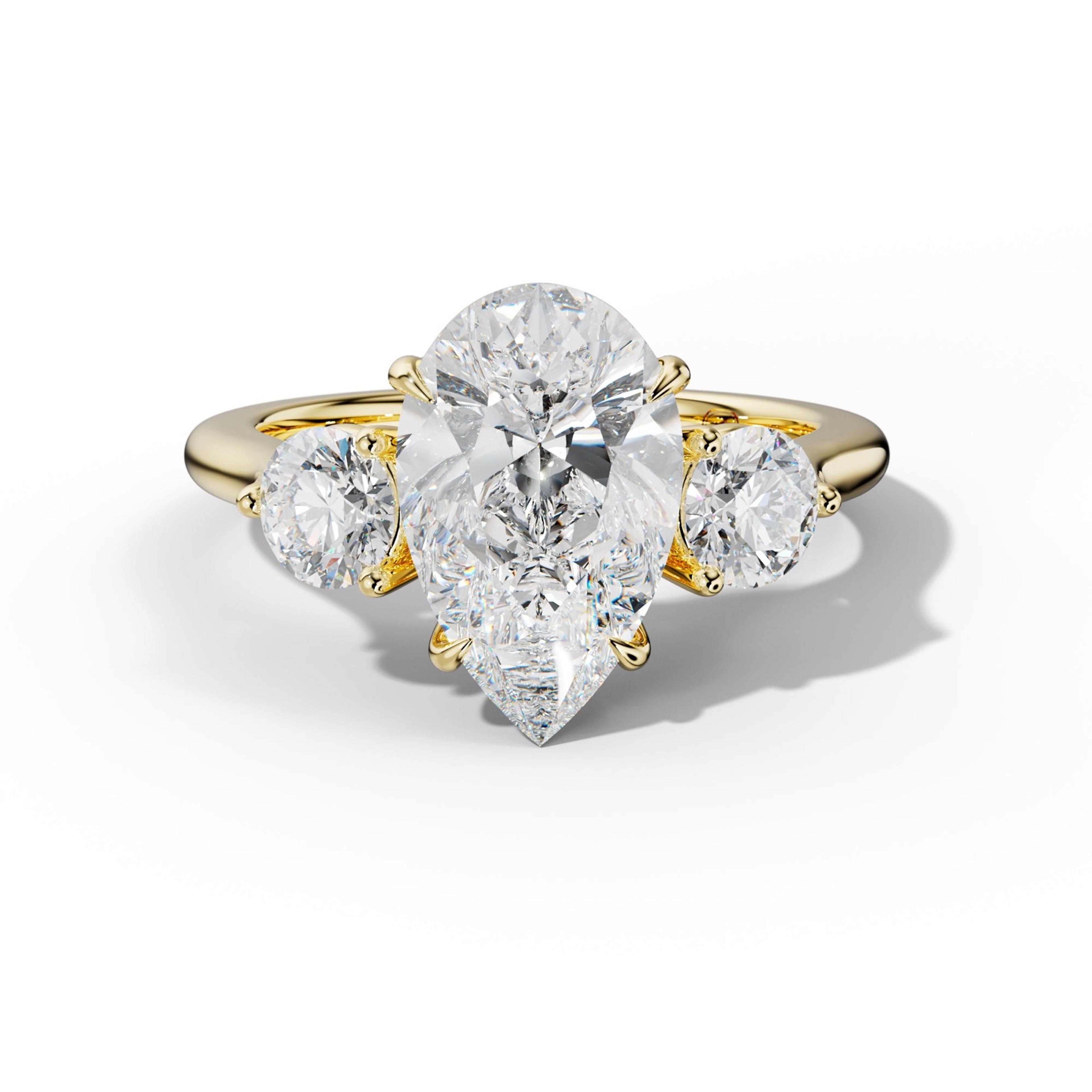 Elsa Pear Shape With Round Side Diamond Engagement Ring