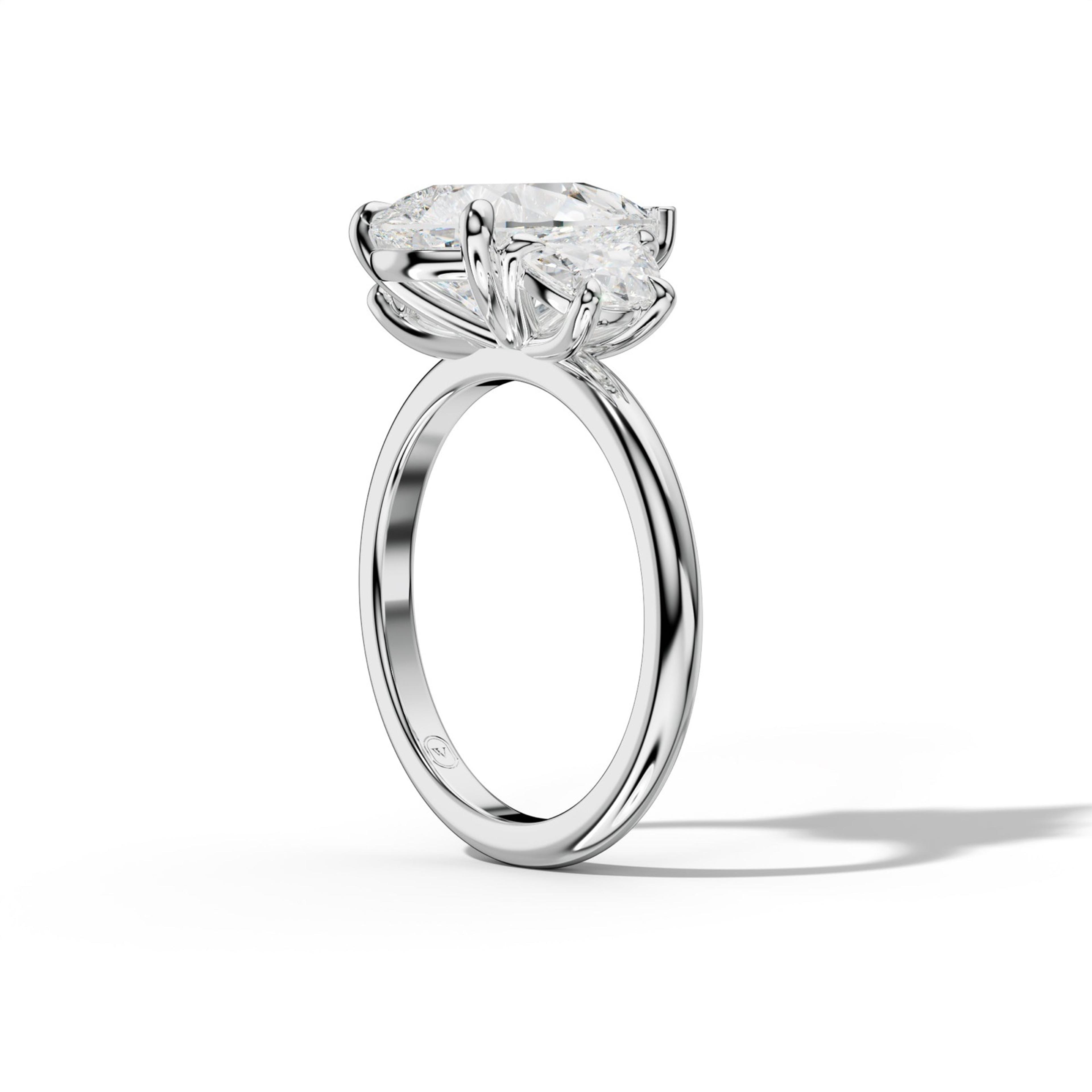 Itzel Pear Shape With Half Moon Side Diamond Engagement Ring