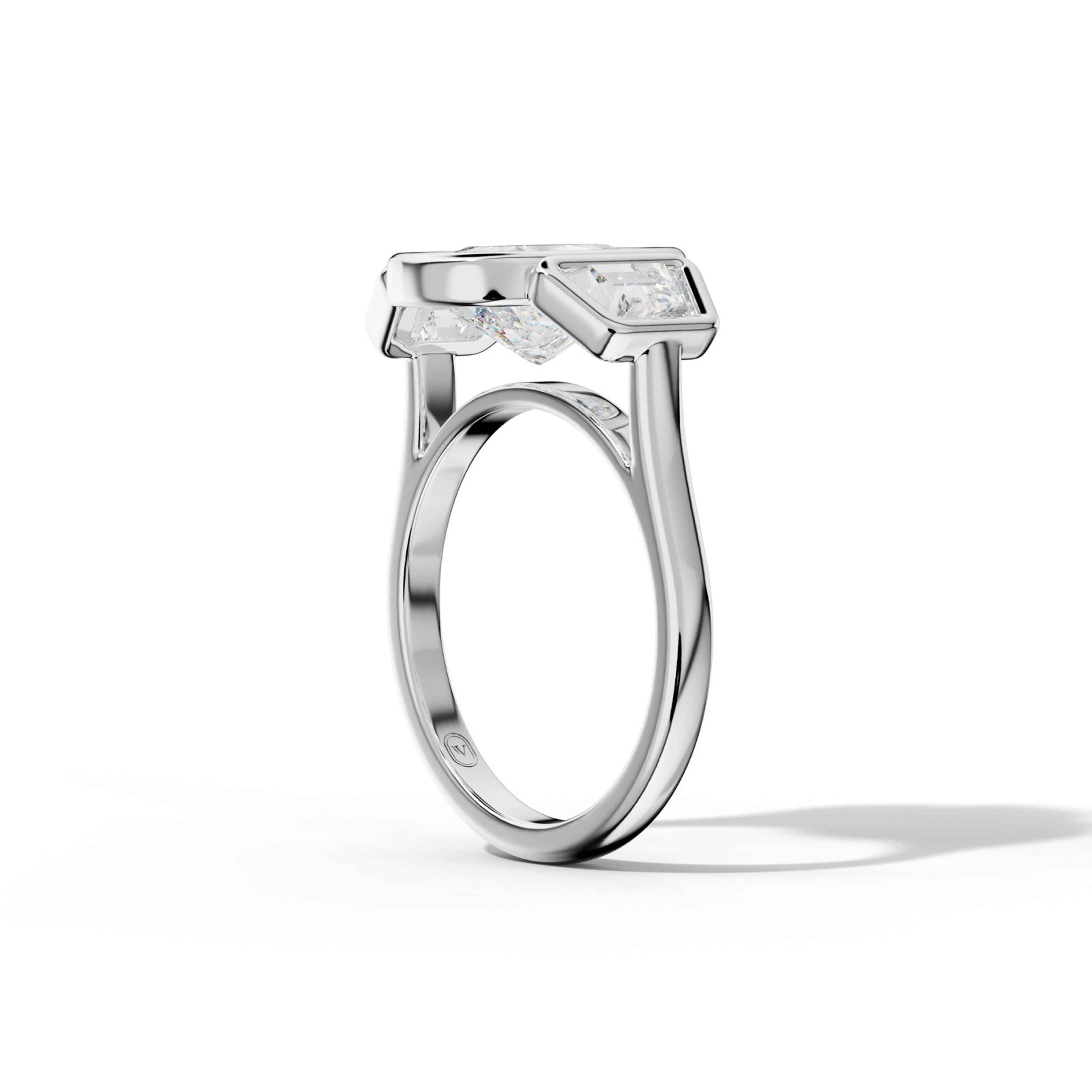 Cleo Elongated Cushion Center With Trapezoid Side Diamond Engagement Ring