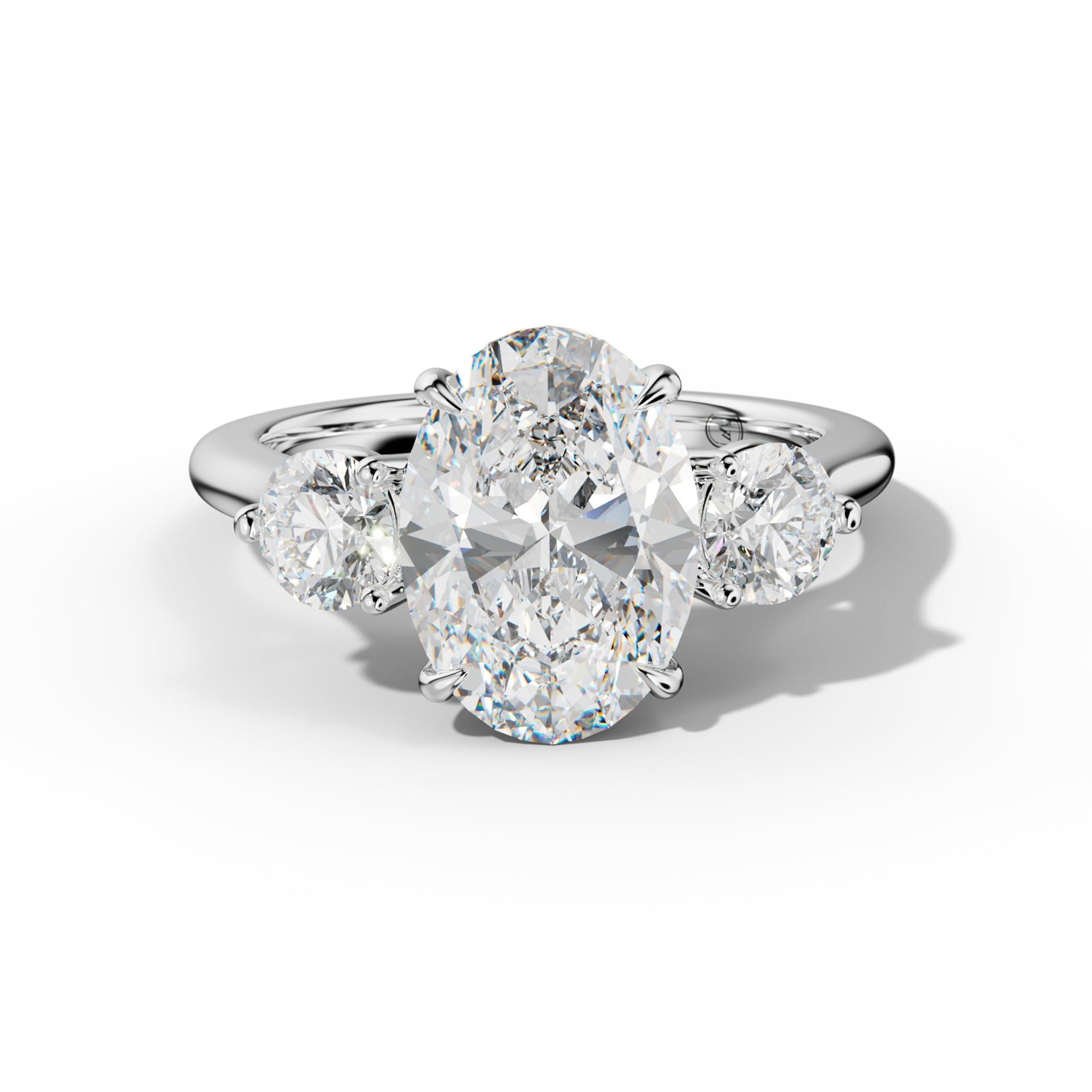 Elsa Oval Diamond Round Side Diamond  Engagement Ring