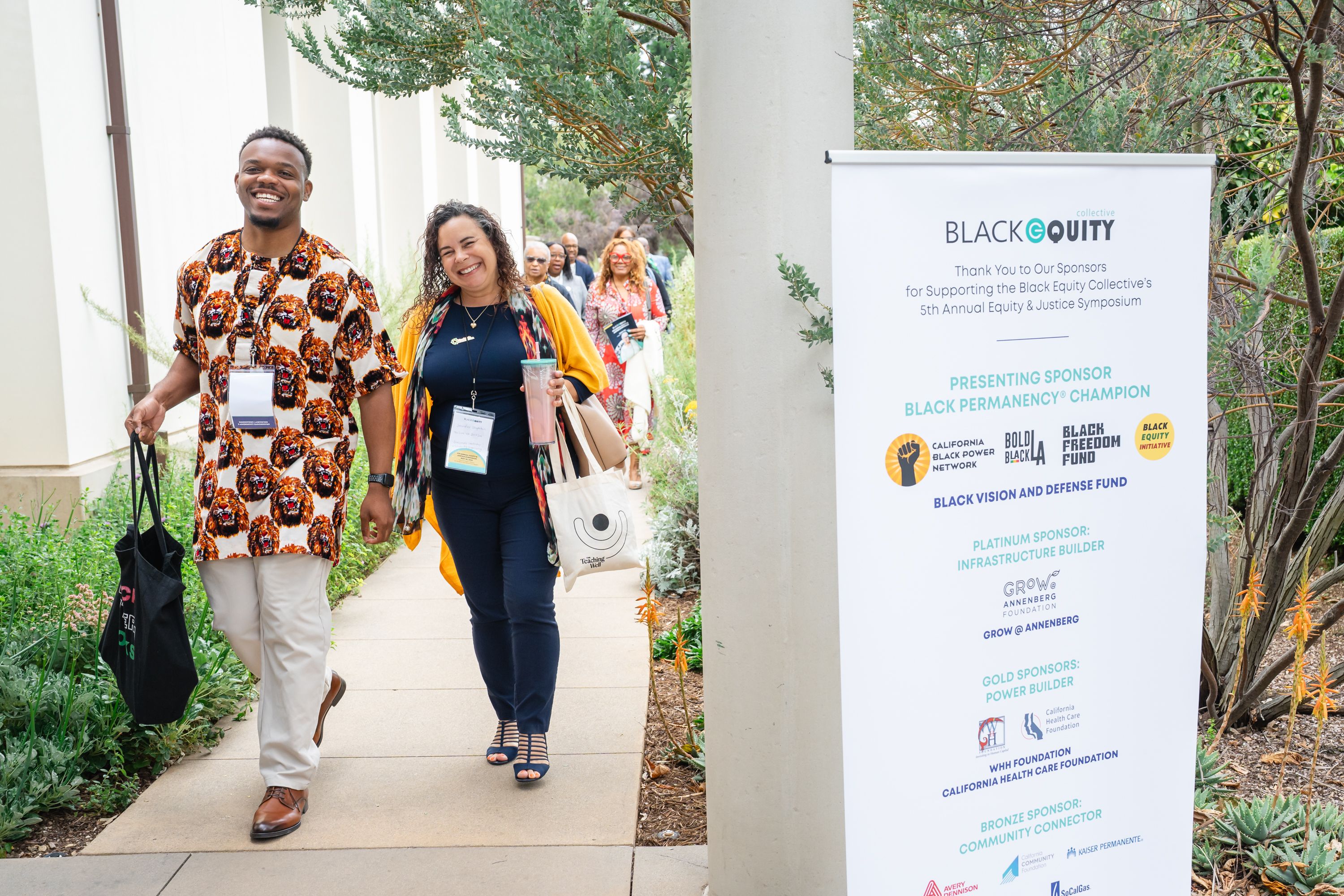 Attendees arriving at a Black Equity Collective sponsored event