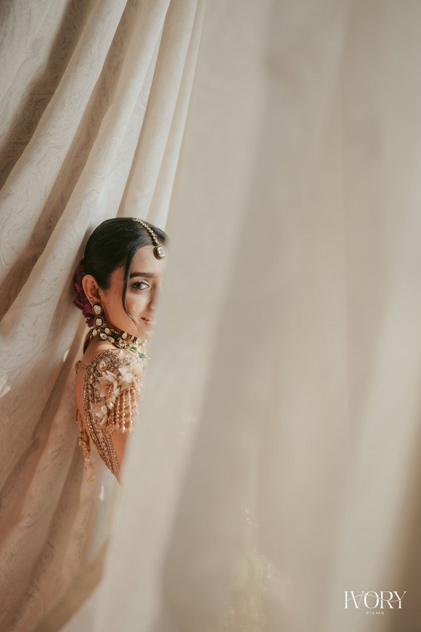 Bride framed through veil