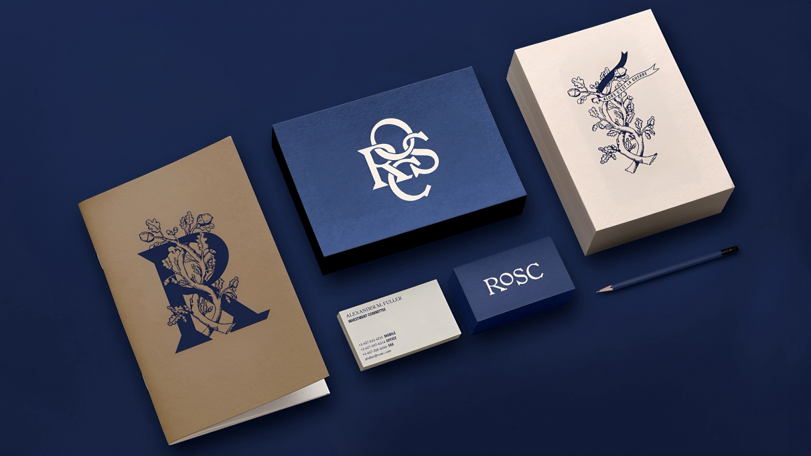 A stationery set featuring all of Rosc's logos on display.