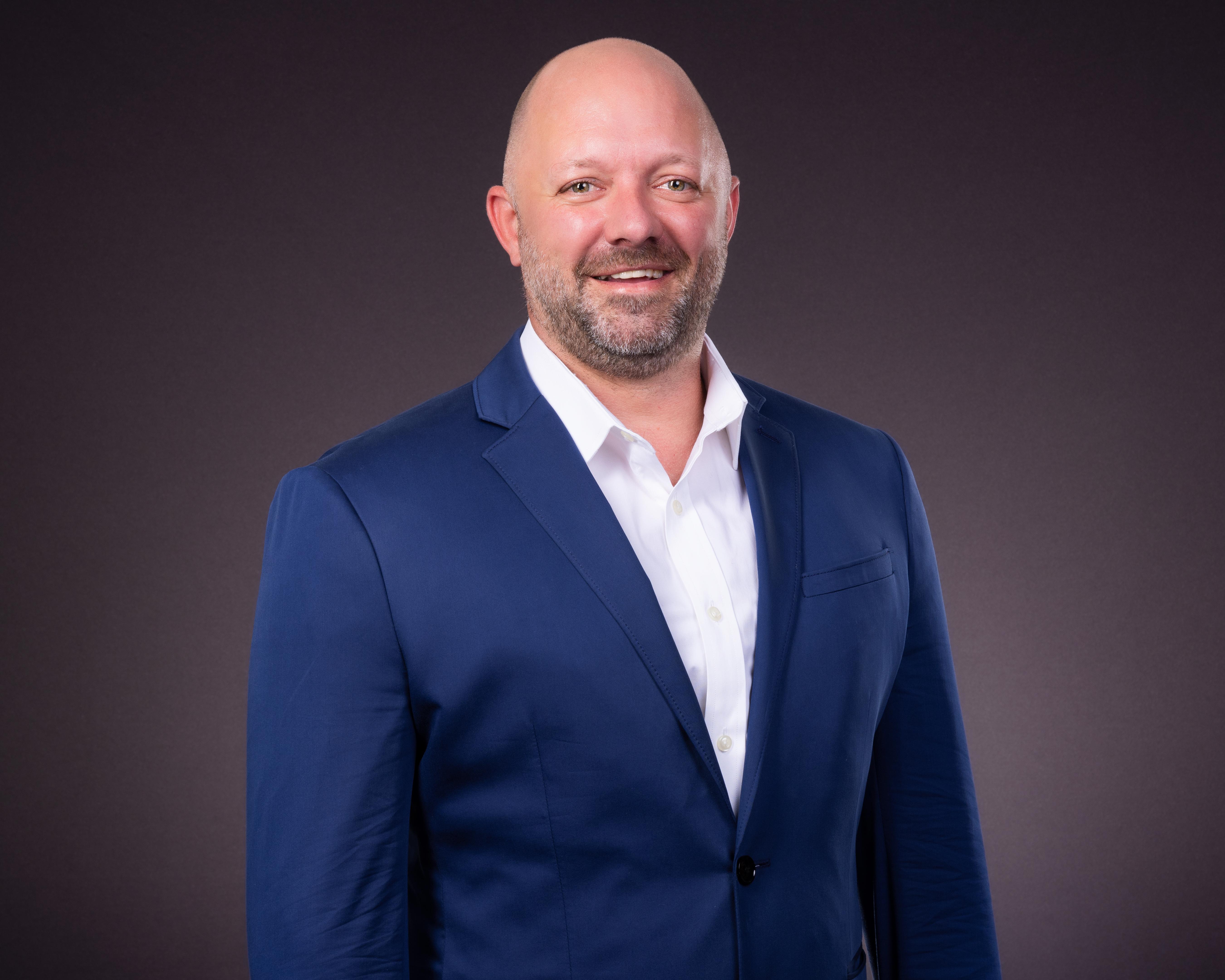 Portrait of board member Josh Stimpson, Director at Reliant Realty