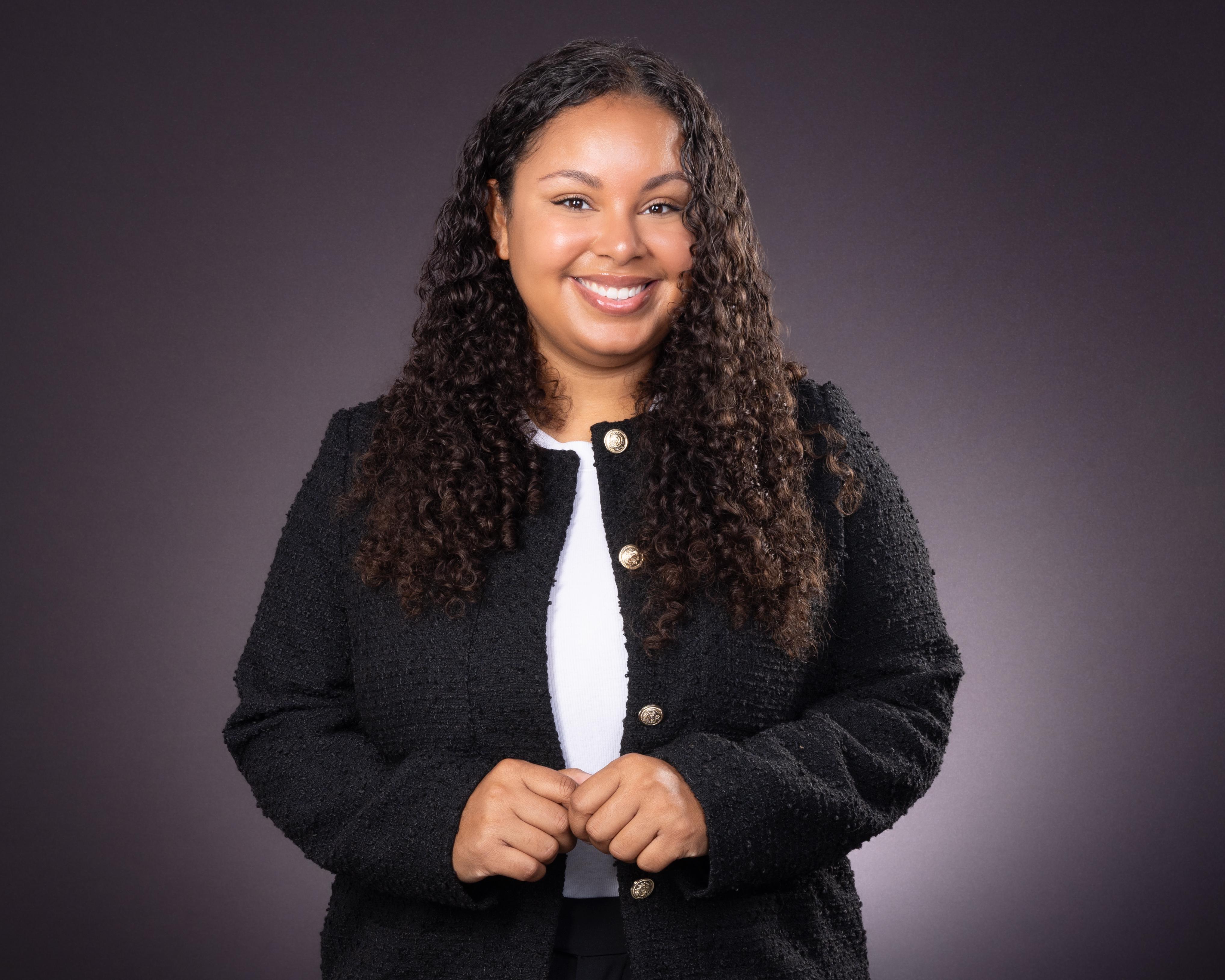 Portrait of board member Jazmyn Bethel, Director at Compass