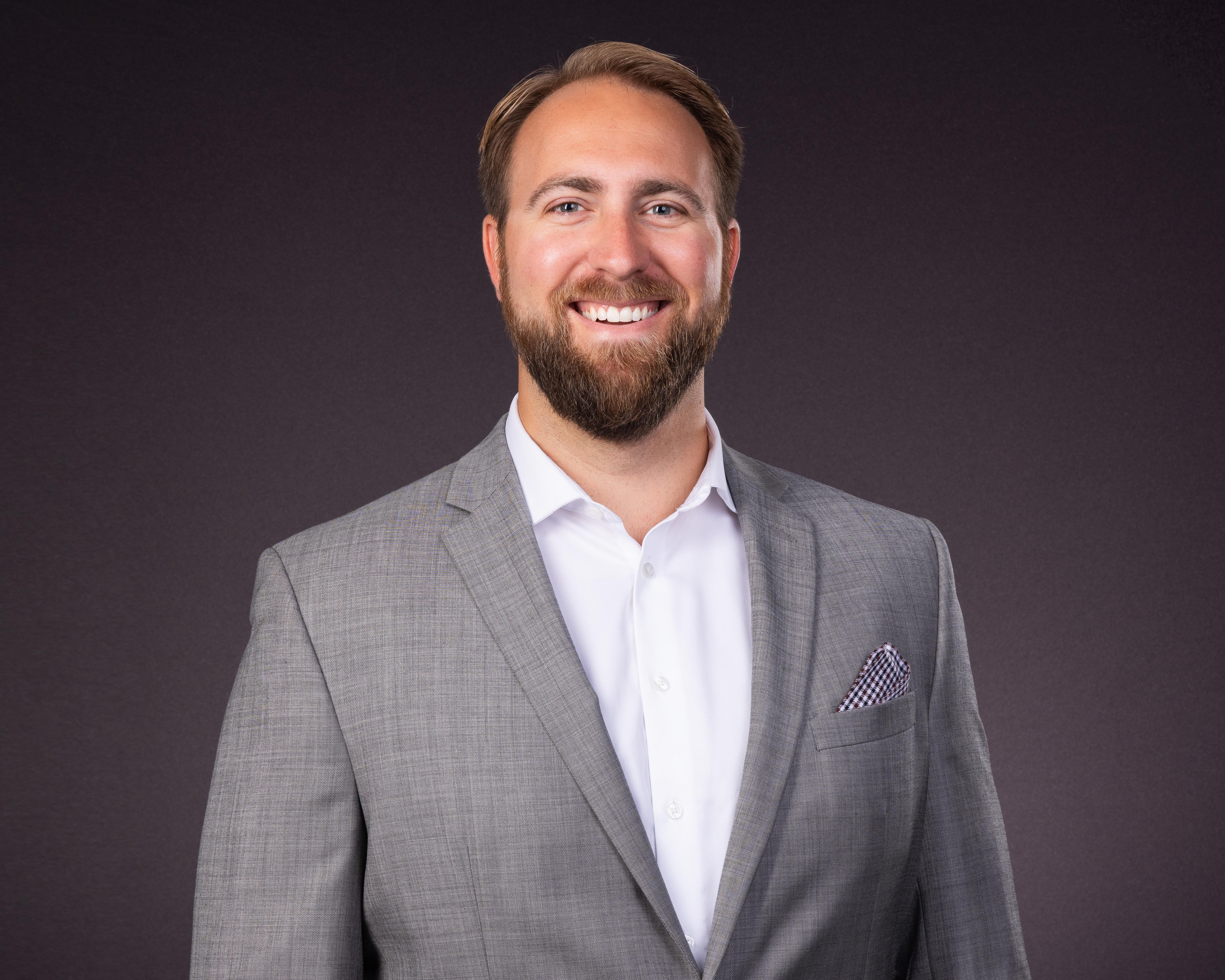Portrait of board member Zach Opheim, Director at Compass