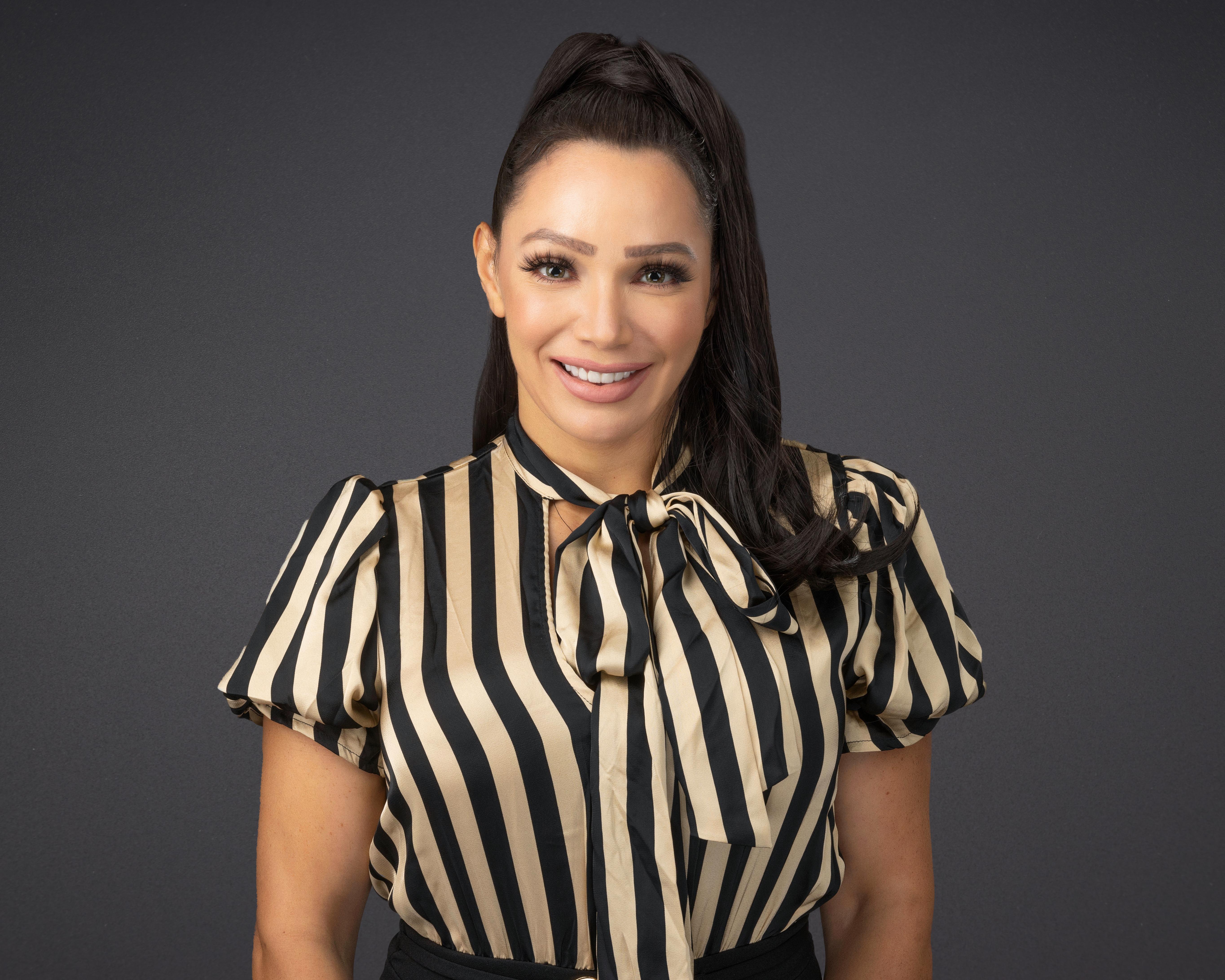 Portrait of board member Eva Angelina Romero, Director at Century 21 Capital Properties