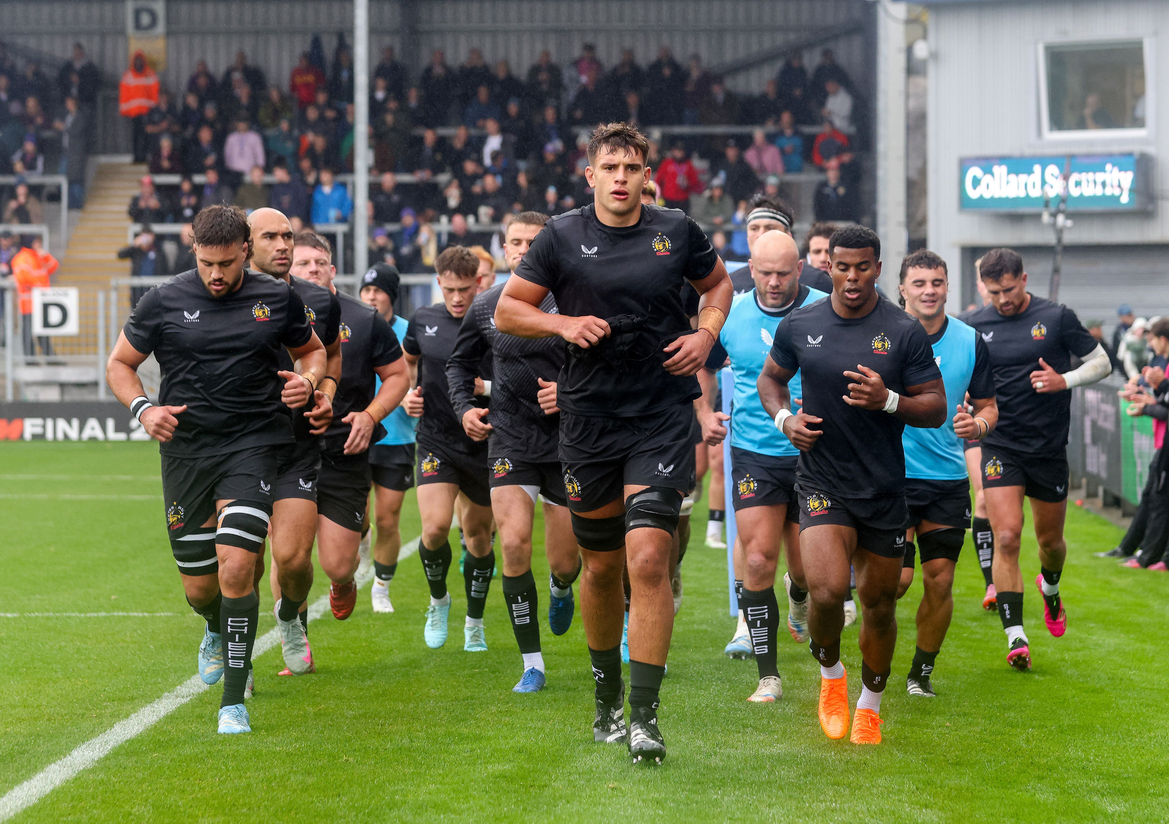 Men's team running in