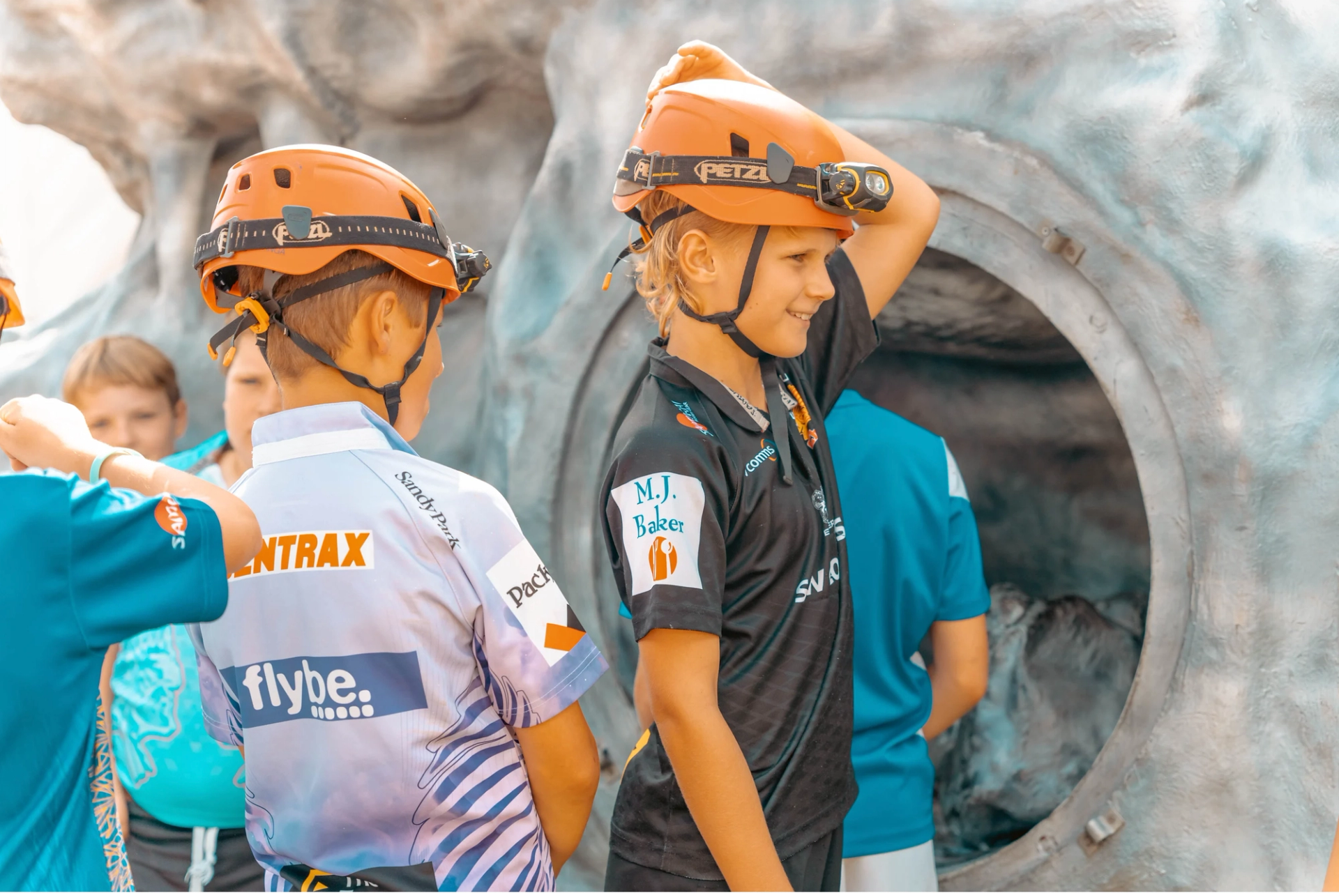 Kids with hardhats on