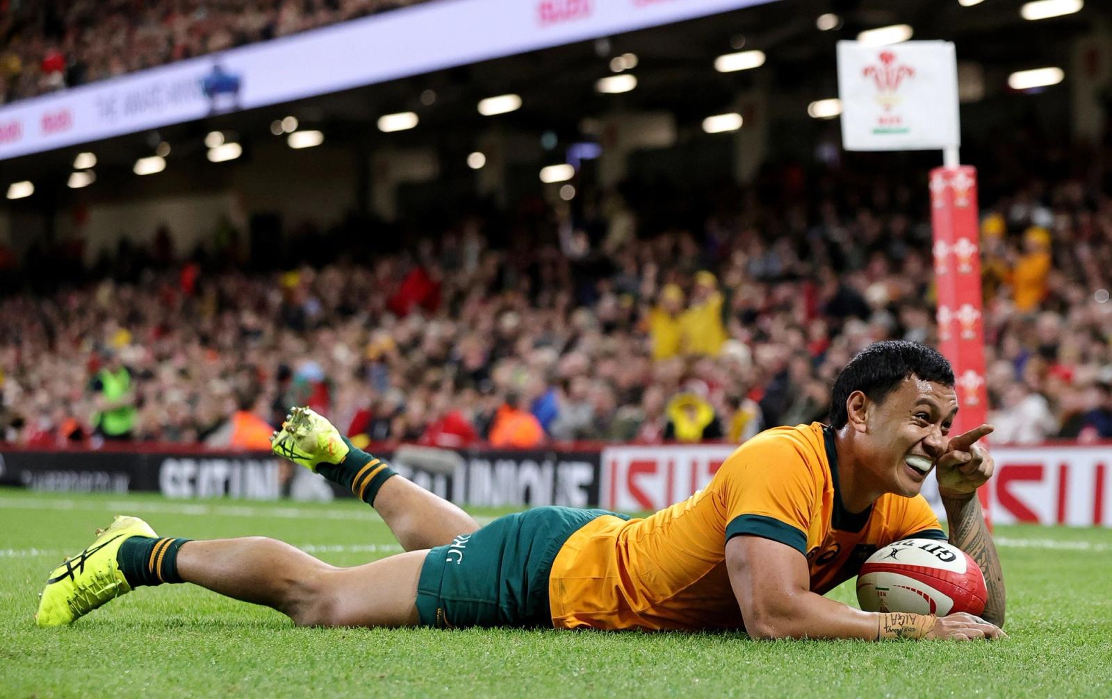 Len Ikitau scoring for Australia against Wales