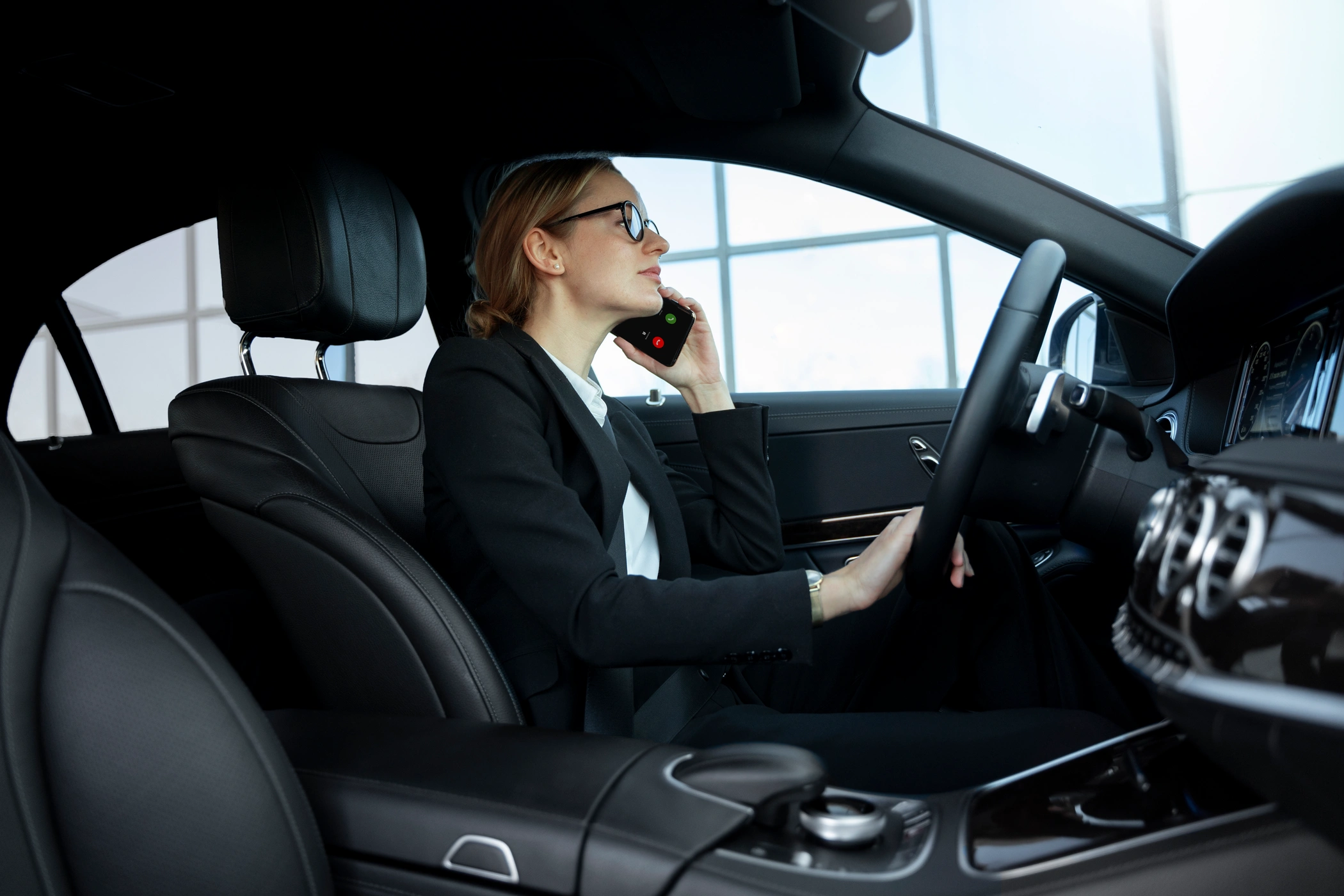 happy woman driving car