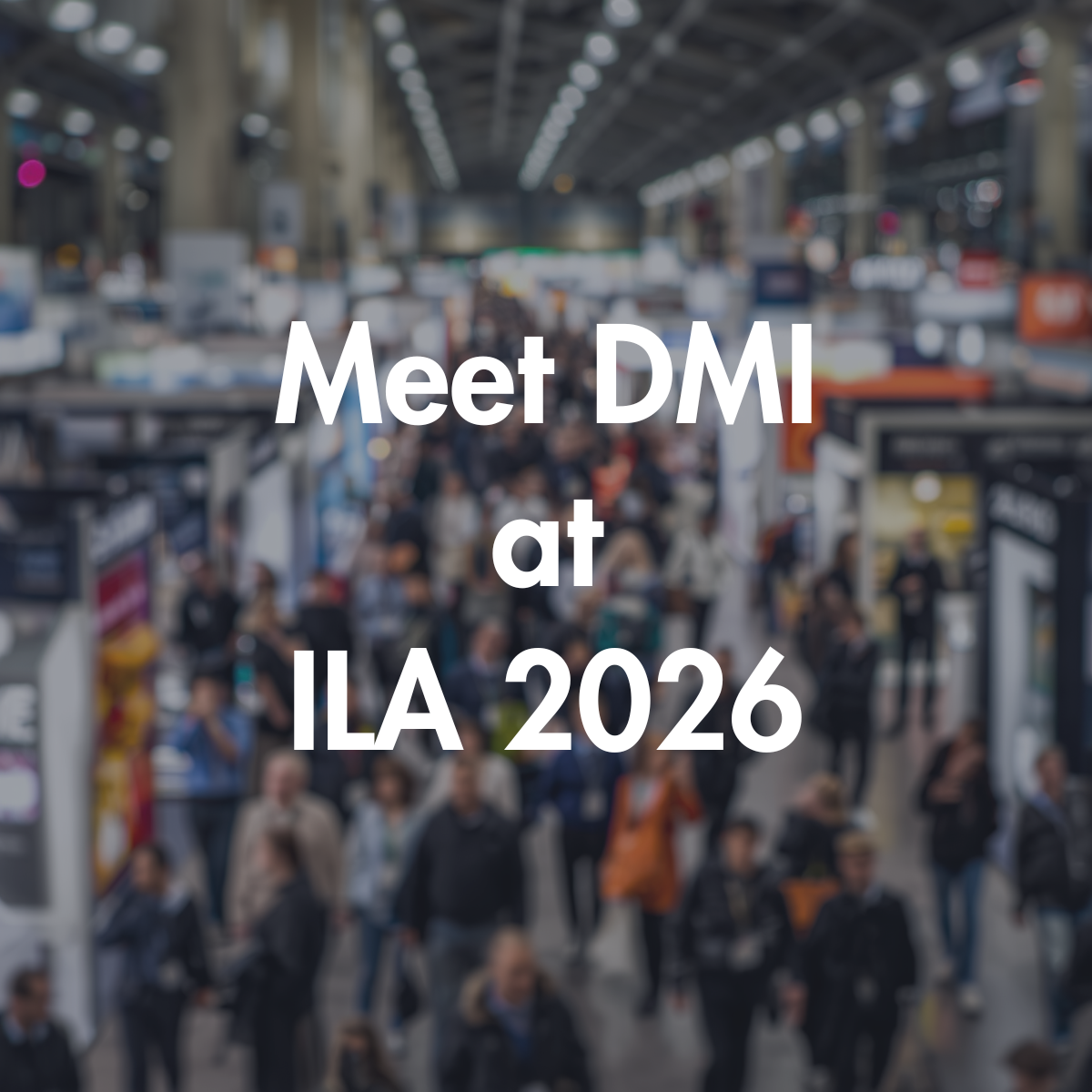 Text on blurred trade fair background "meet DMI at ILA 2026