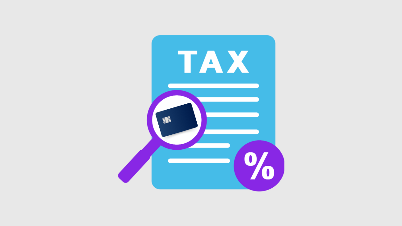 Magnifying glass with tax form and credit card