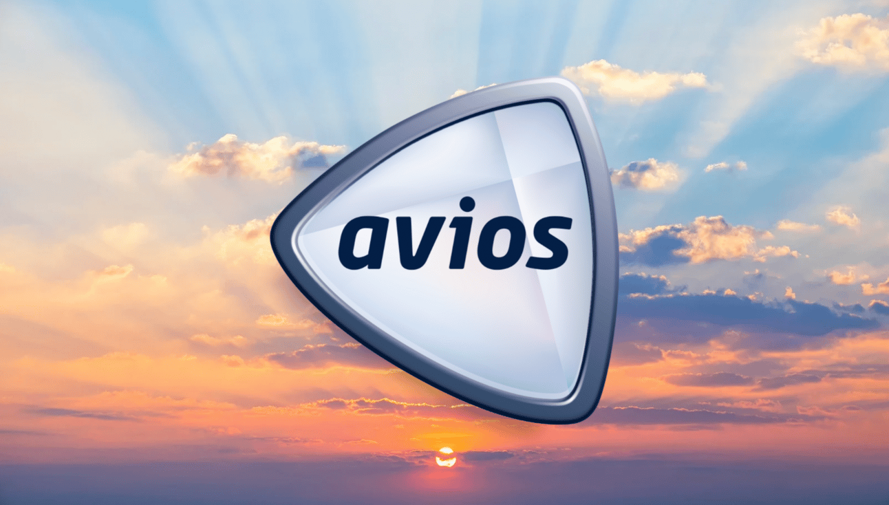 The gray Avios logo with a sunset sk background