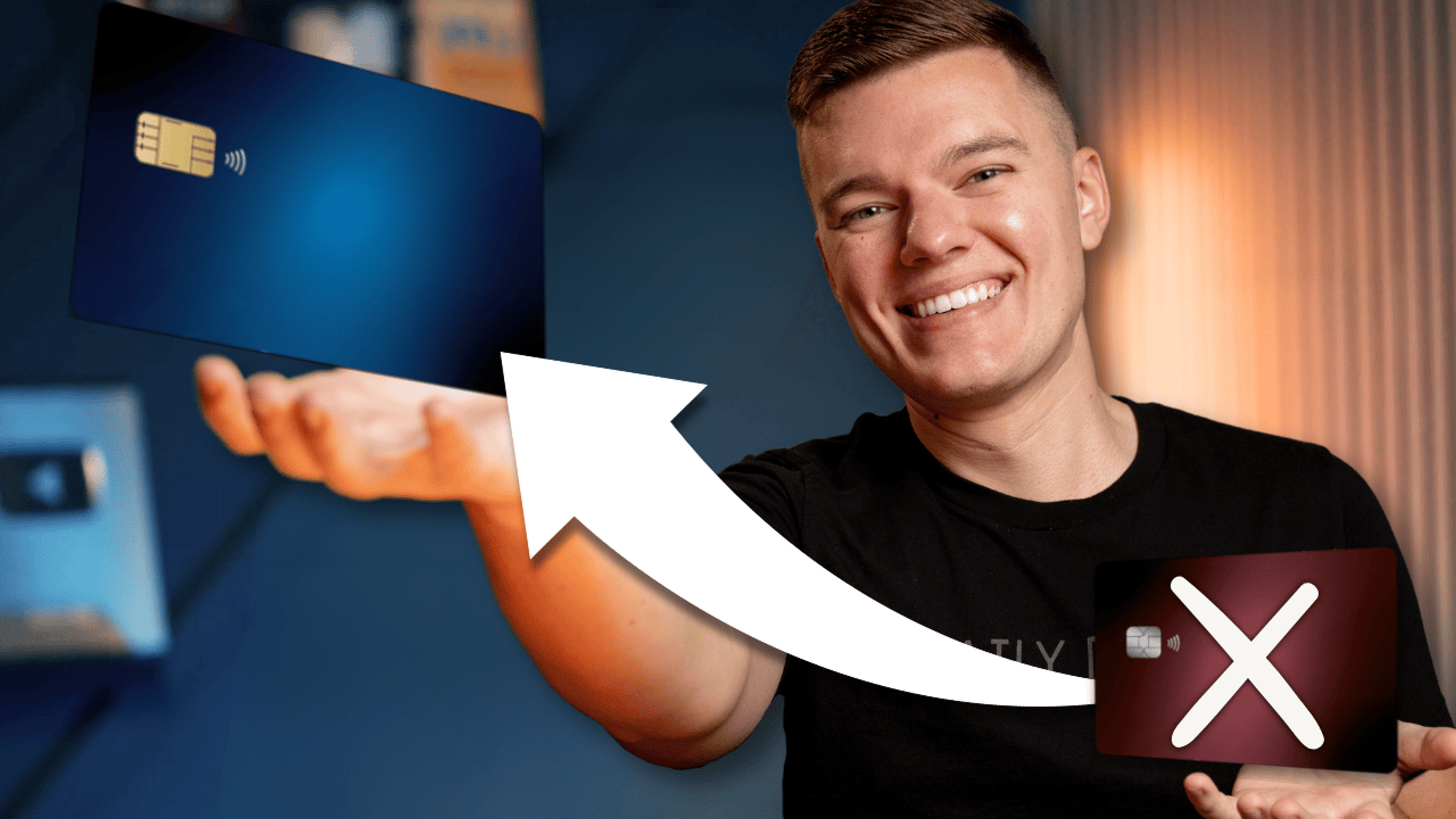 A man holding two credit cards
