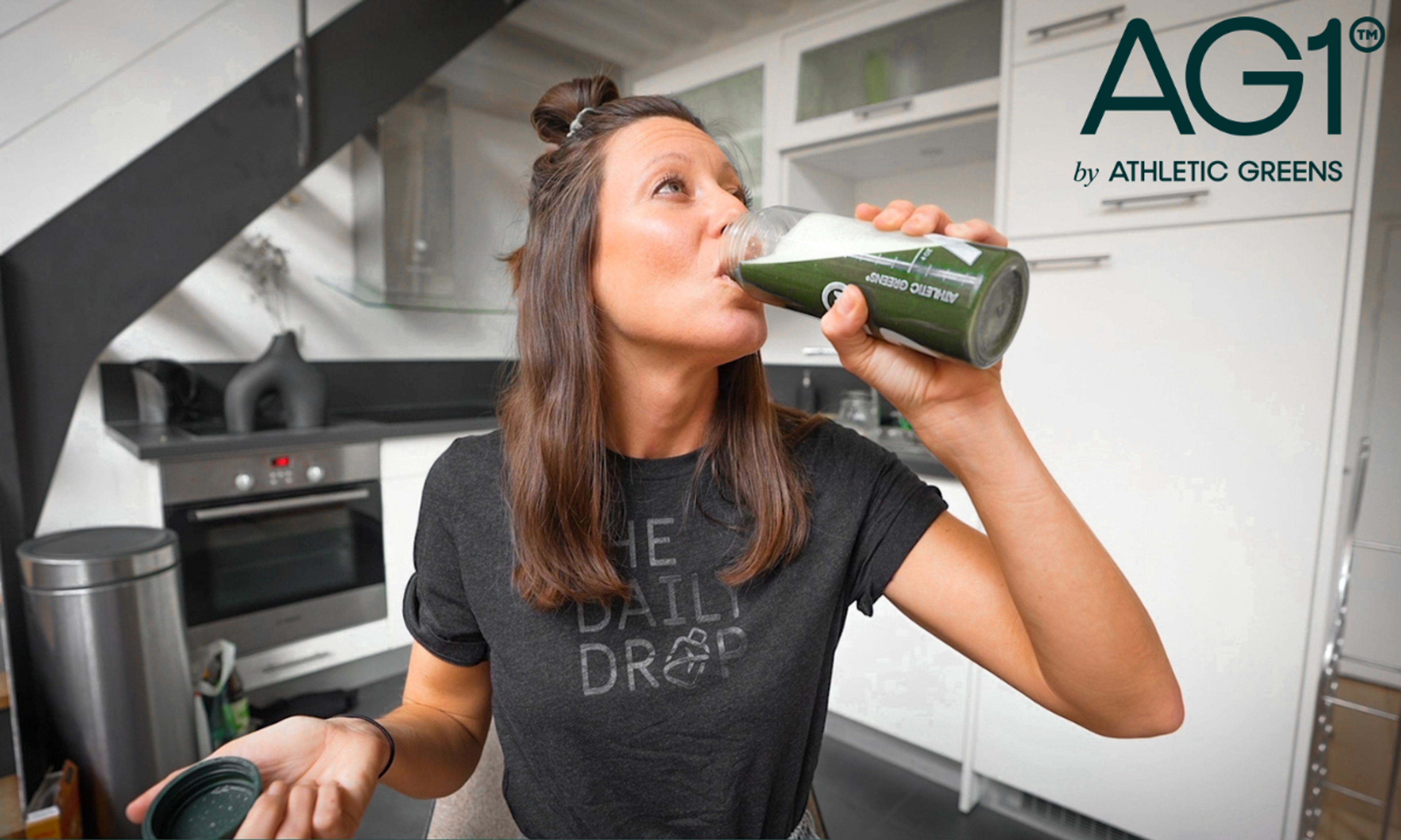 Kara drinking Athletic Greens