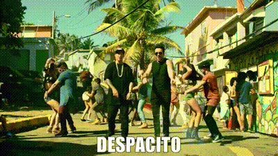 Gif of singer and dancers in the Despacito music video