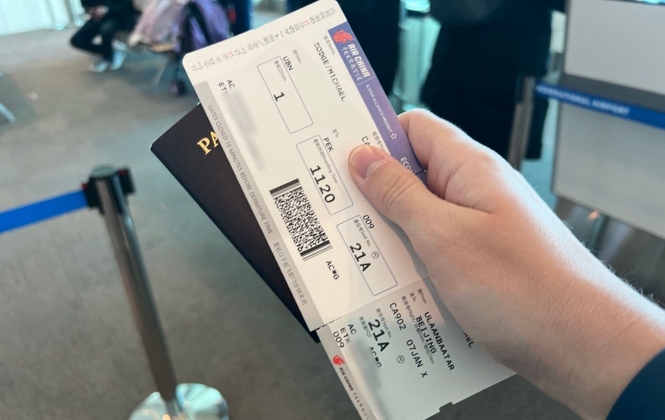 A photo of Mike's boarding pass to enter China
