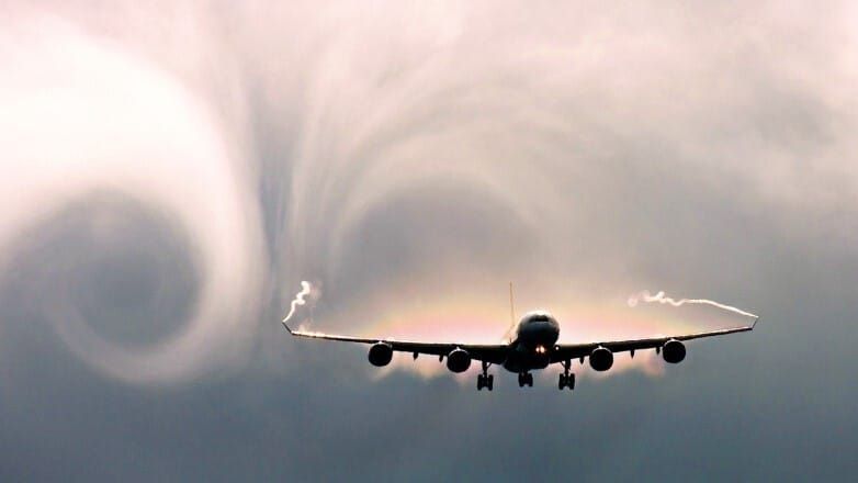 A photo of a plane going through turbulence