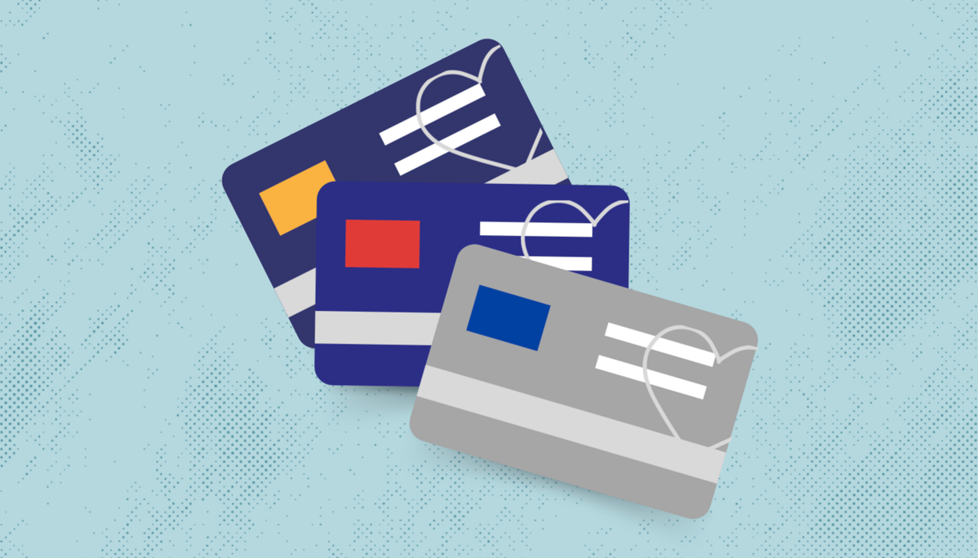 Three credit cards on a blue background