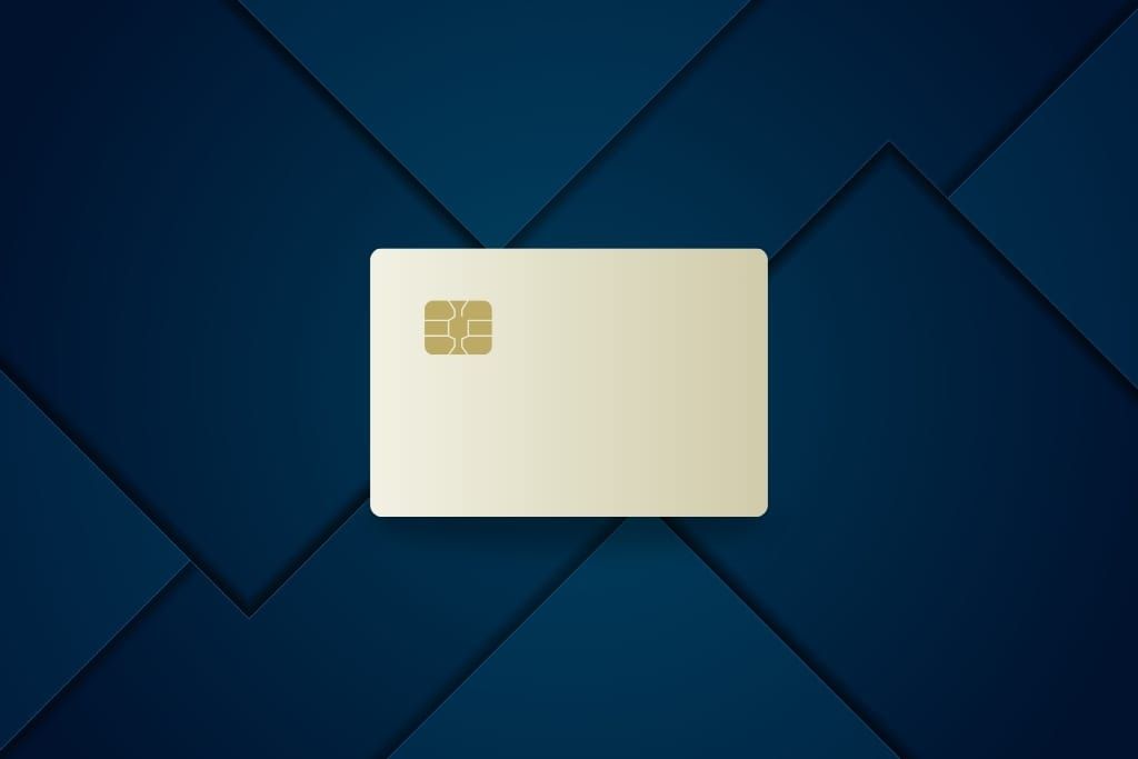 A gold credit card graphic on a navy blue background