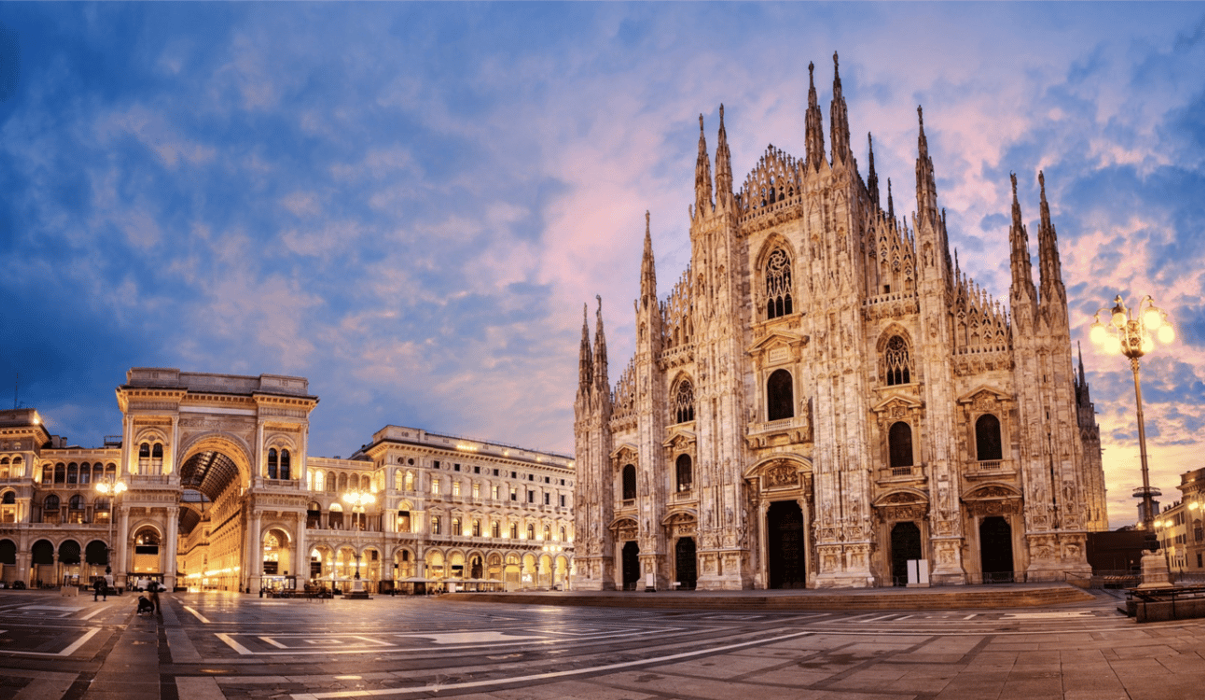 An image of the Milan cathedral at sunrise