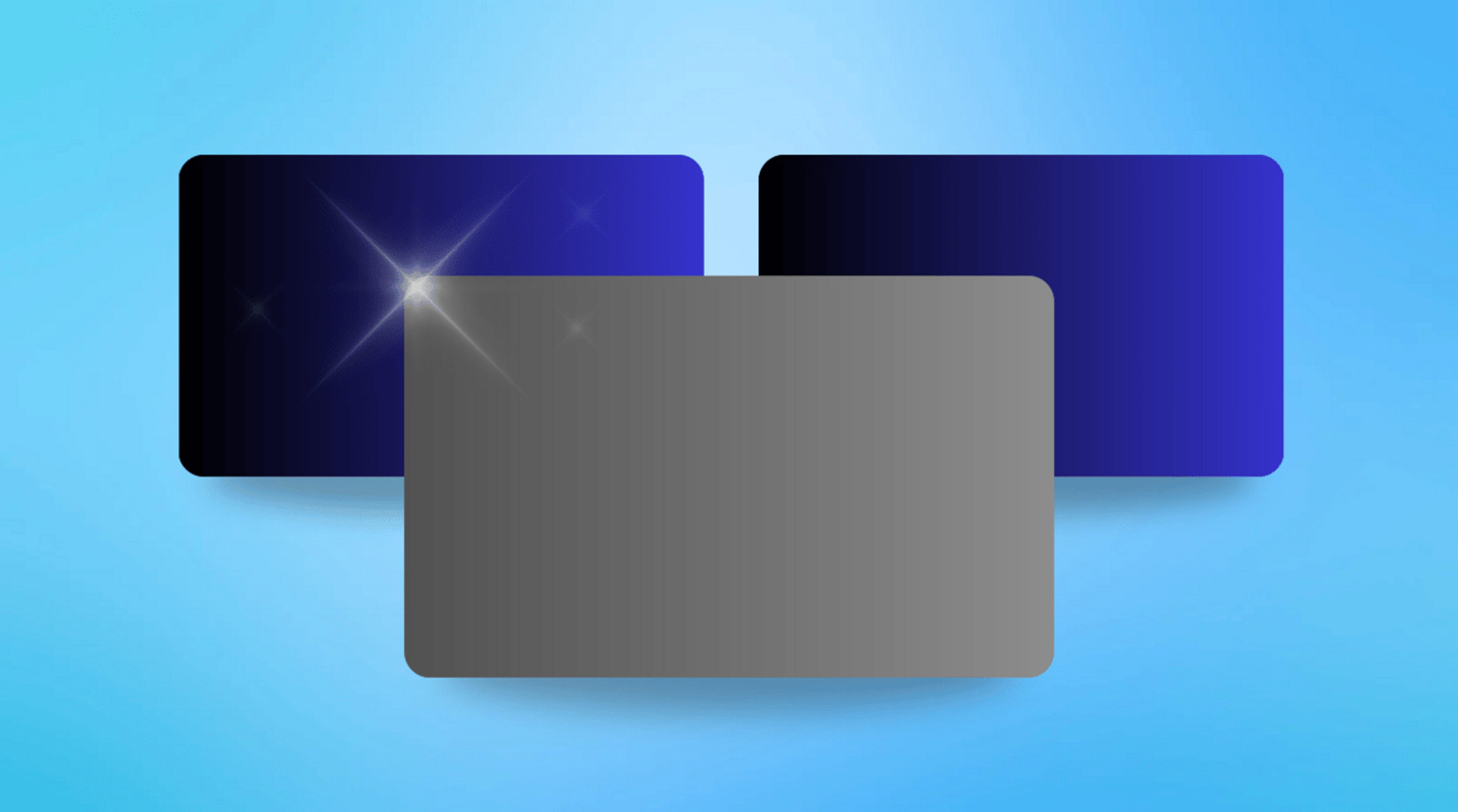 Two blue credit card graphics and one grey card graphic