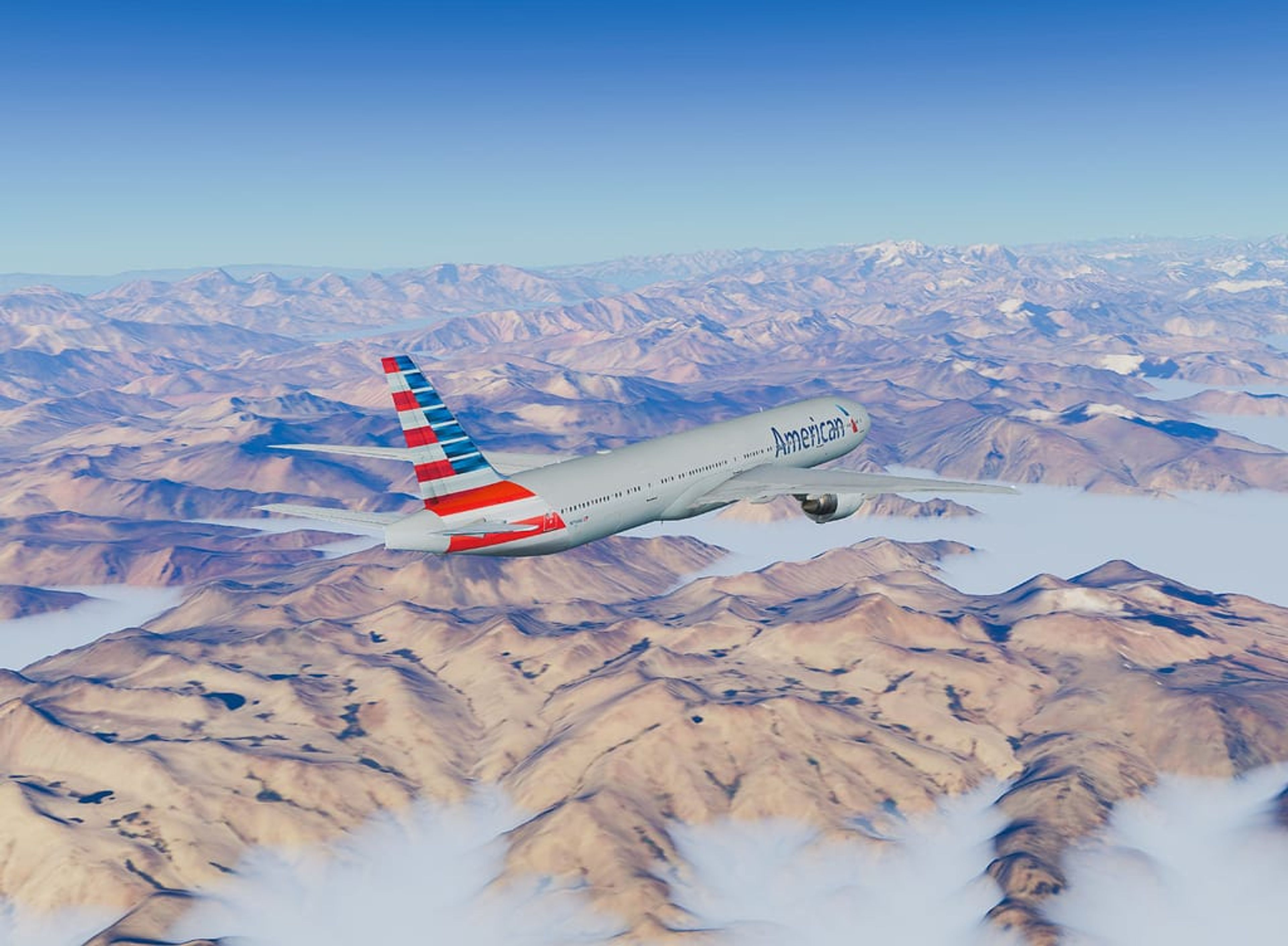 American Airlines flying over mountains