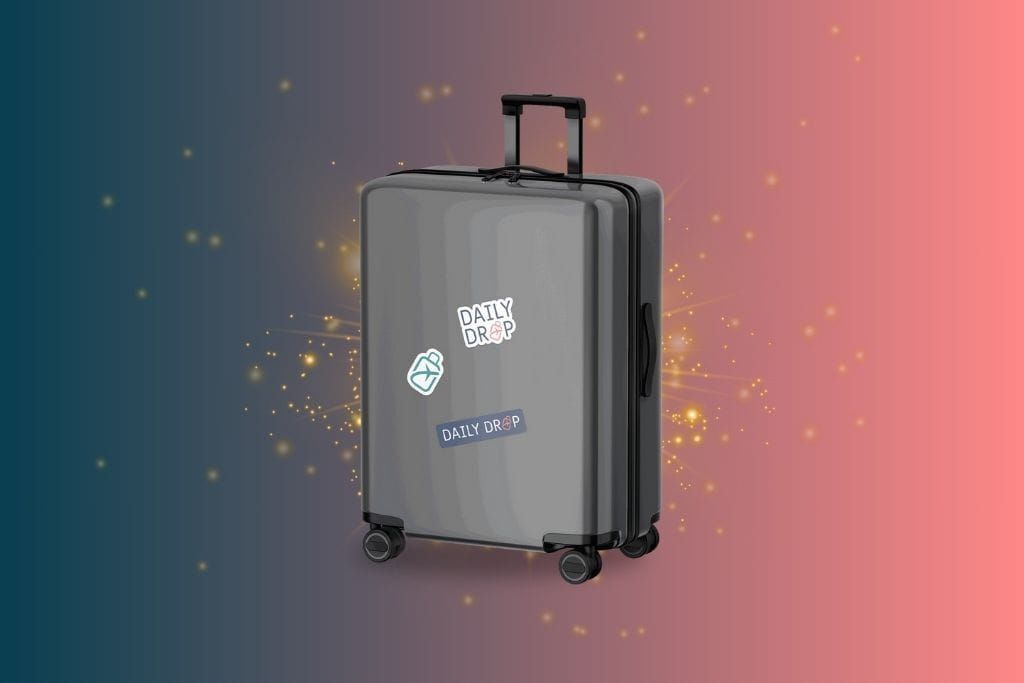 A grey suitcase with DD stickers on it with a blue and pink ombre background