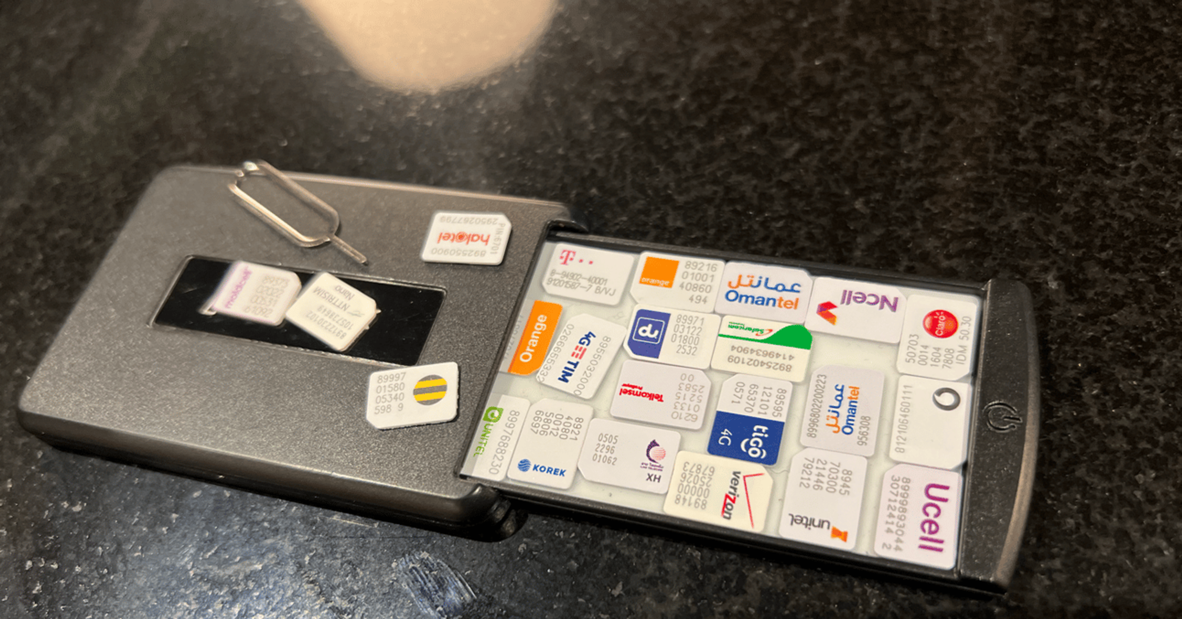 A photo of my obnoxious SIM card holder