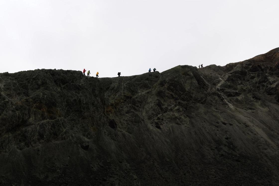 Hikers on Bláhnukur in Landmannalaugar