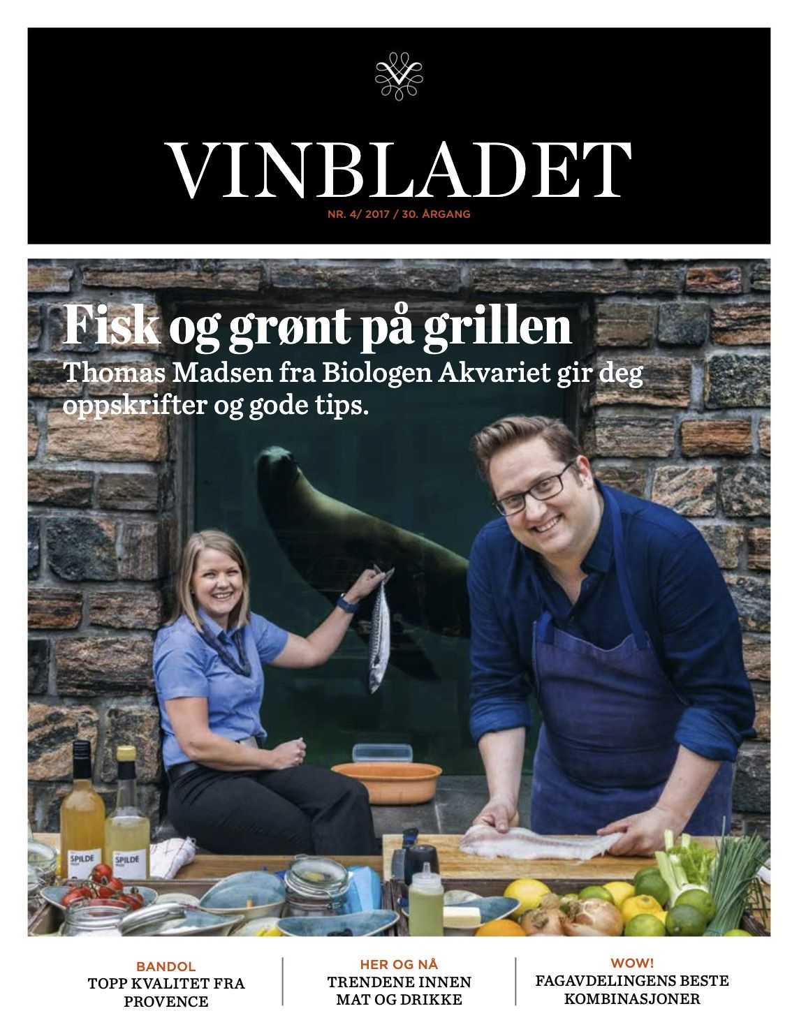 Magasinforside med to personer som tilbereder fisk.