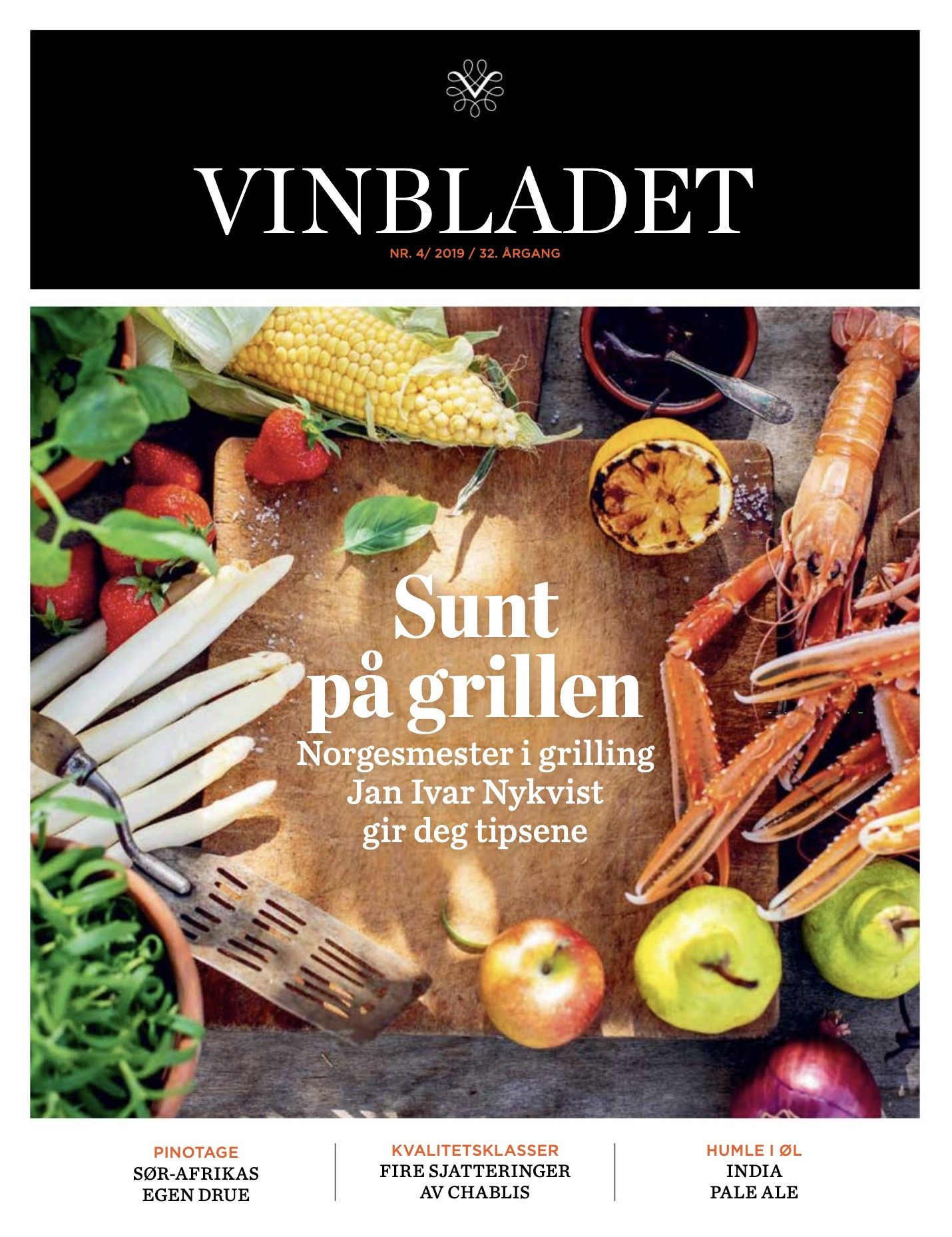 Magasinforside med frukt, grønt og hummer på et skjærebrett.