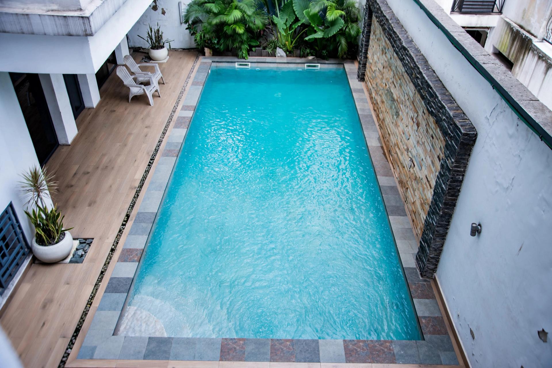 Appartement Bonapriso, appartement meublé, appartement 3 chambres, appartement piscine, appartement domotique, appartement parking sécurisé, appartement location Douala, appartement proche Energy Club Bonapriso.