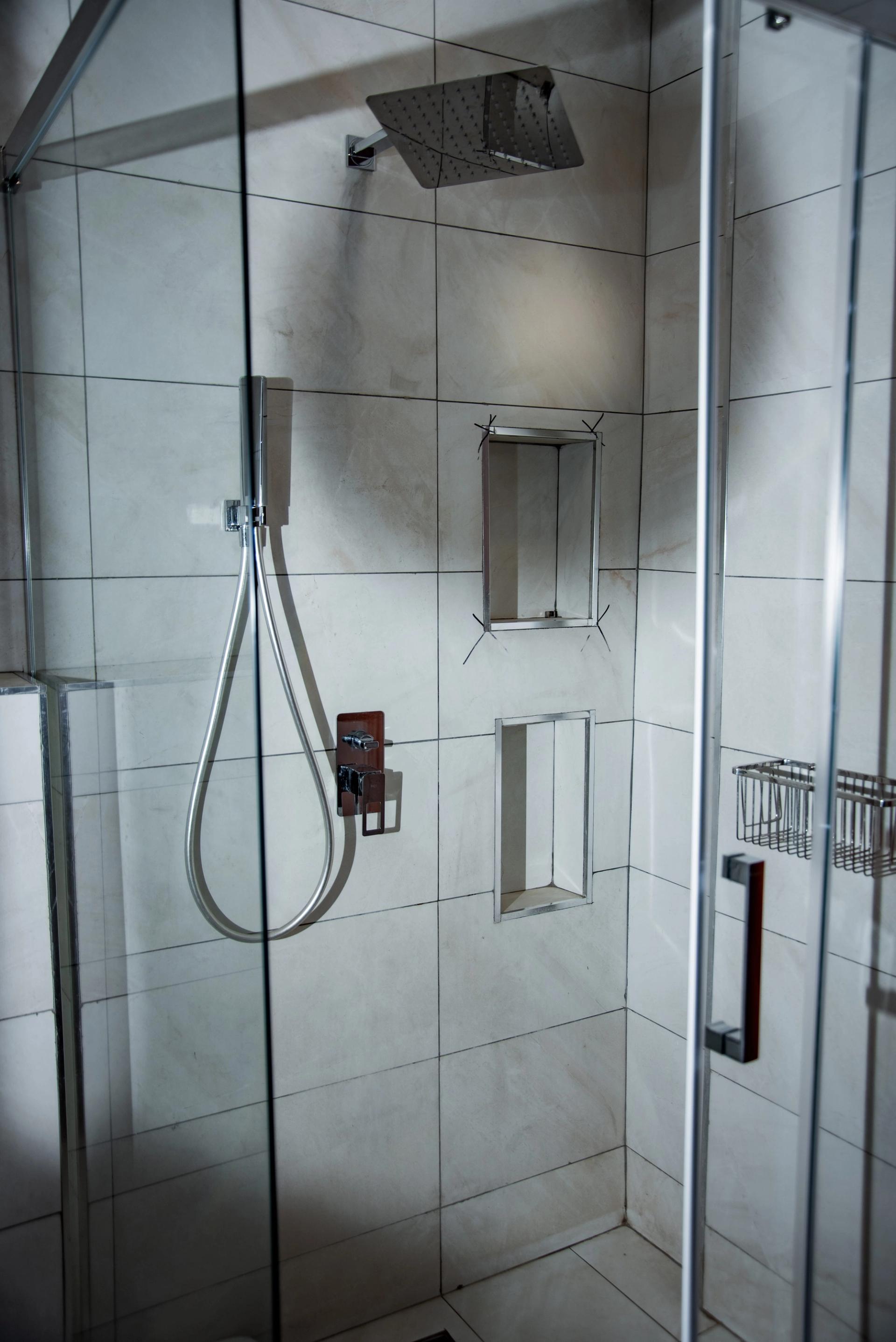 Appartement à louer Bonapriso, appartement meublé, appartement 3 chambres, appartement piscine, appartement domotique, appartement parking sécurisé, appartement location Douala, appartement proche Energy Club Bonapriso.