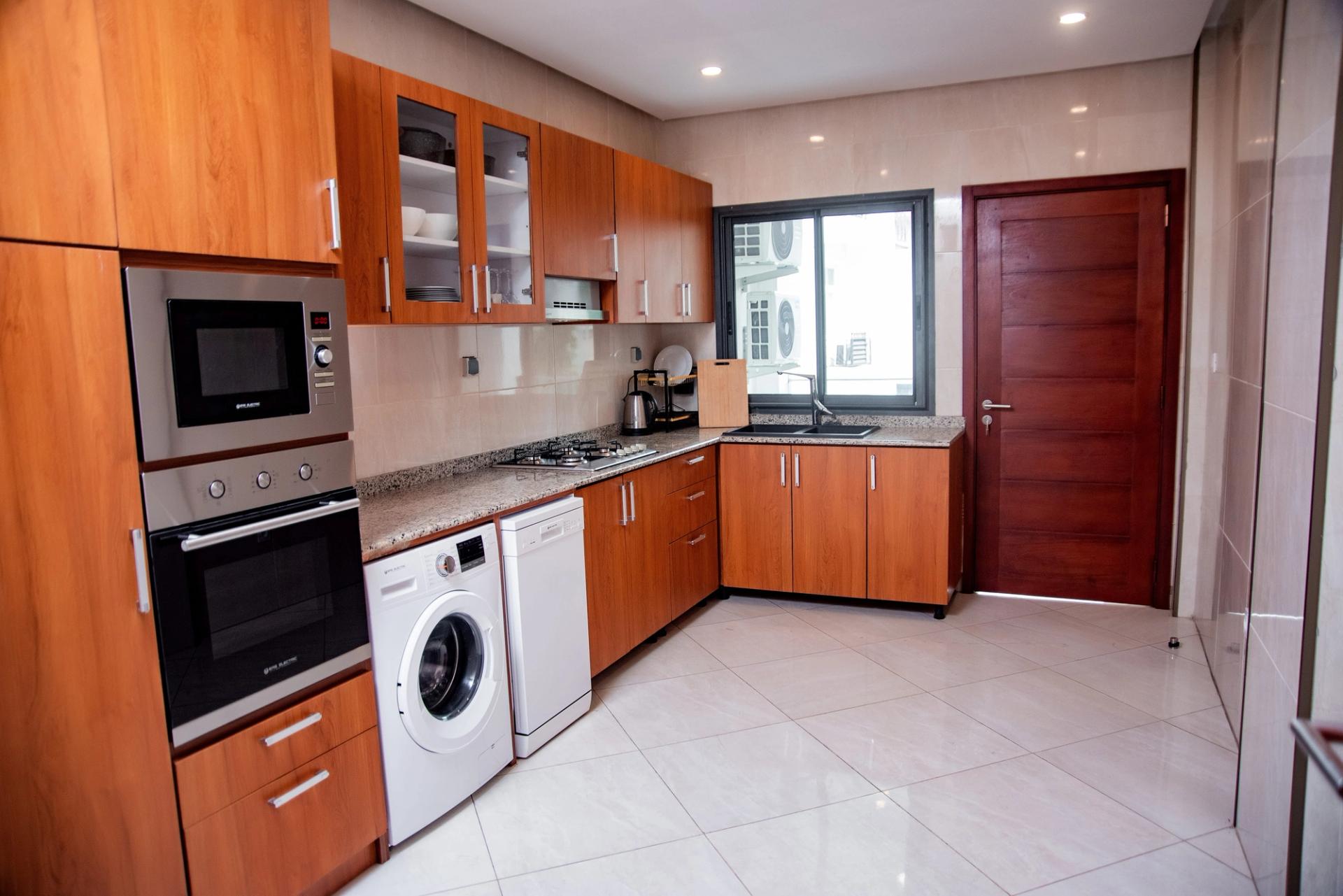 Appartement à louer Bonapriso, appartement meublé, appartement 3 chambres, appartement piscine, appartement domotique, appartement parking sécurisé, appartement location Douala, appartement proche Energy Club Bonapriso.