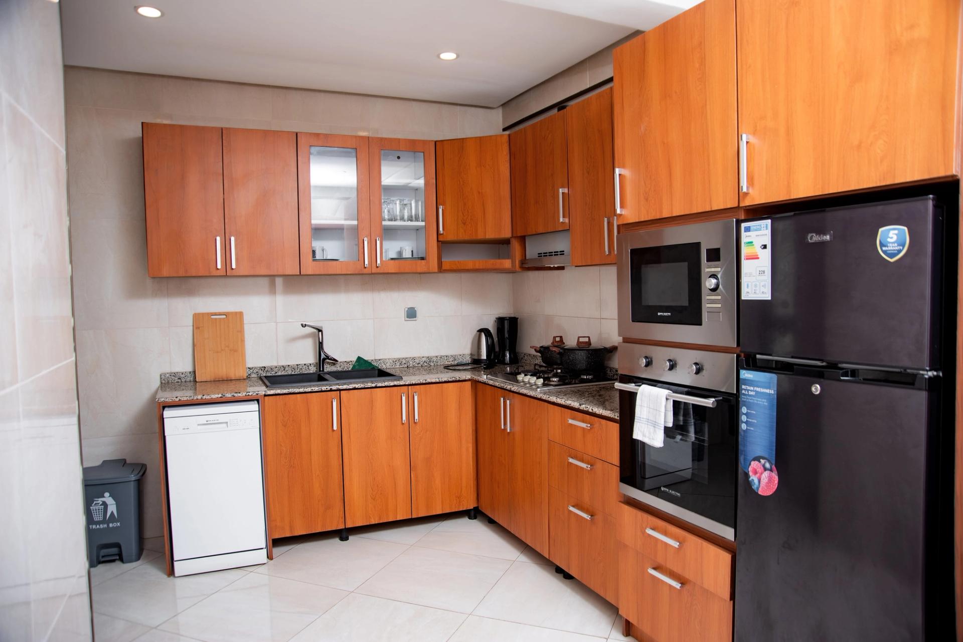 Appartement Bonapriso, appartement meublé, appartement 3 chambres, appartement piscine, appartement domotique, appartement parking sécurisé, appartement location Douala, appartement proche Energy Club Bonapriso.