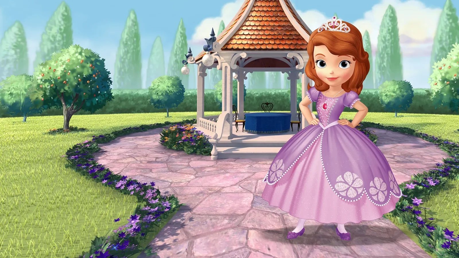 Sofia the First in her princess dress and tiara in a sunny palace garden