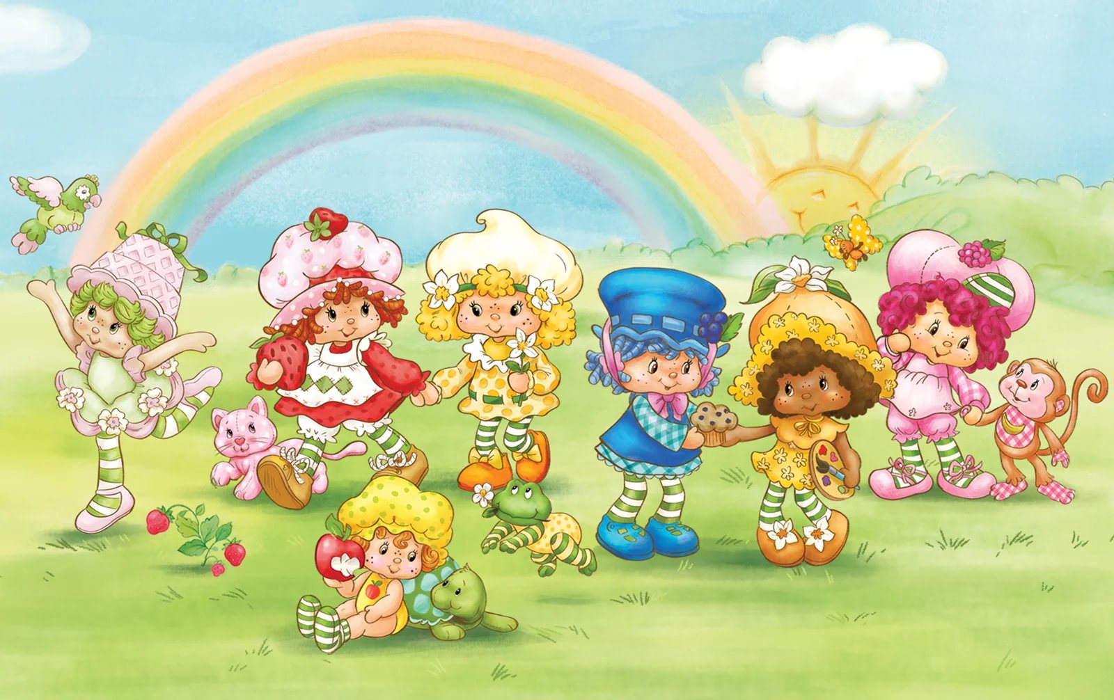 Classic Strawberry Shortcake and friends in a meadow beneath a pastel rainbow
