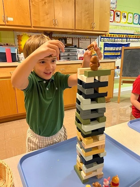 Day School Student building with blocks