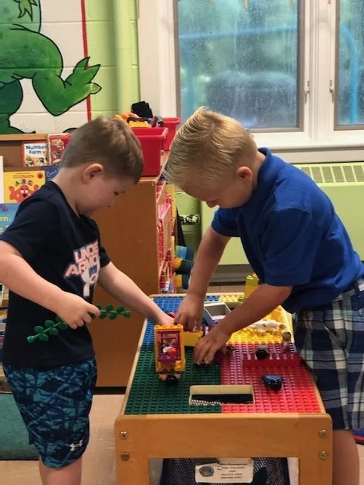 Day School Students playing with toys