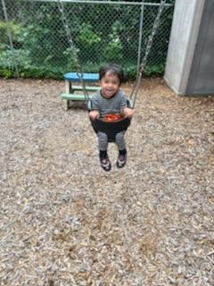 Day School Student on swing
