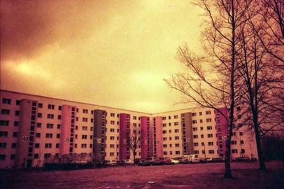 From another time. | Olympus XA | Kodak Gold 200 | Redscale photography DIY Surreal view of houses.