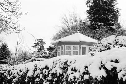 Snow-covered house roof. Snow-covered house roof.
